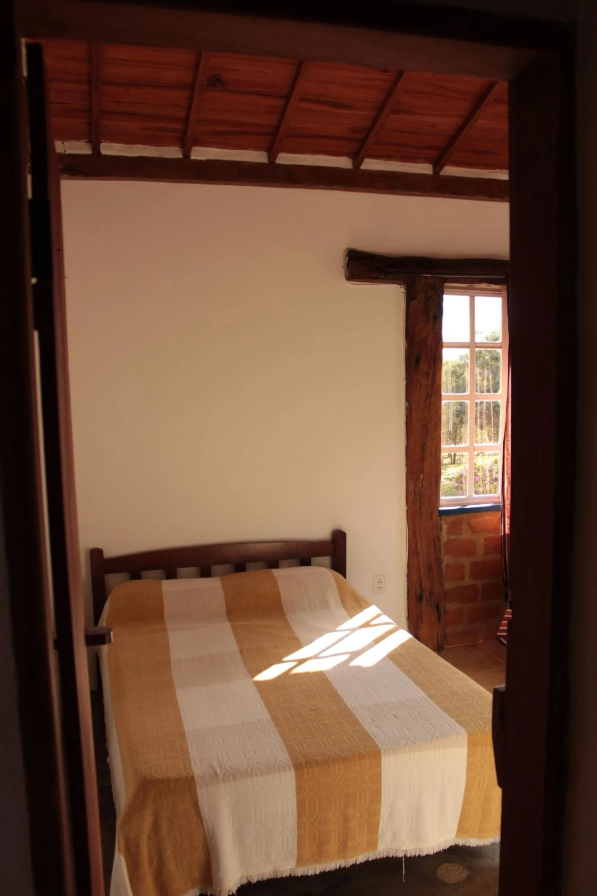 Bed in Pousada Chalé Terra Viva