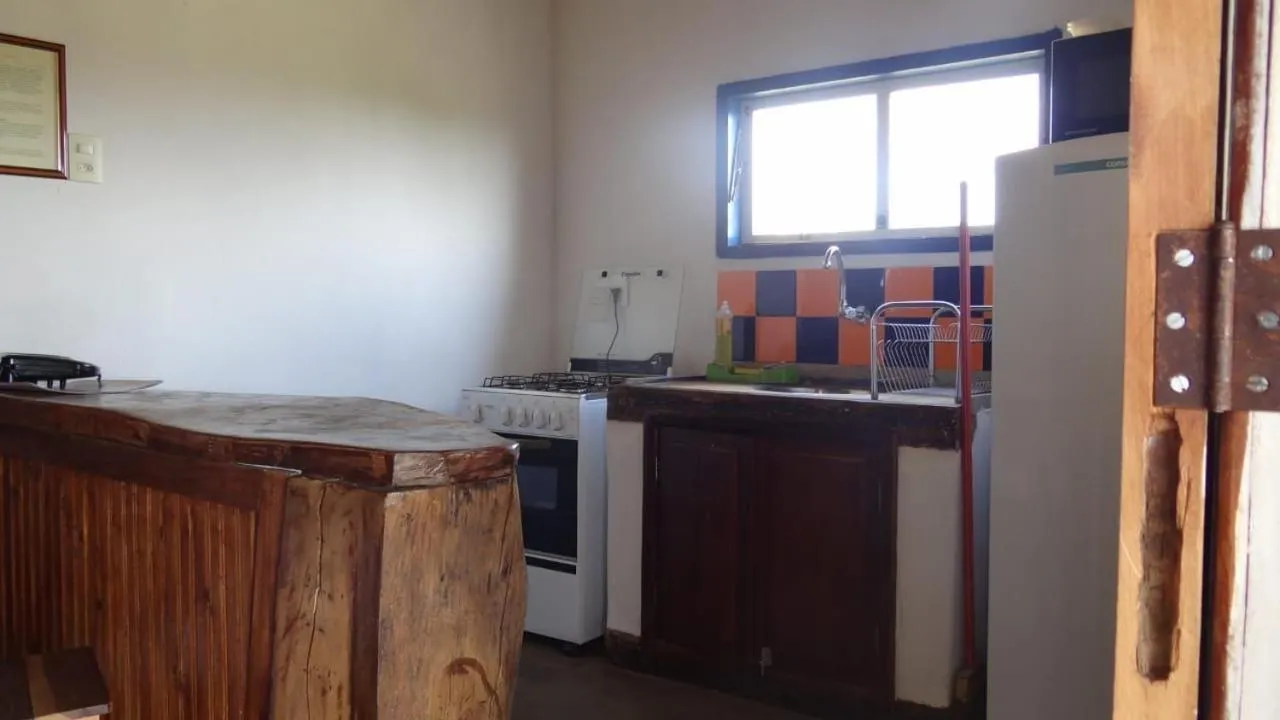 Kitchen or kitchenette in Pousada Chalé Terra Viva