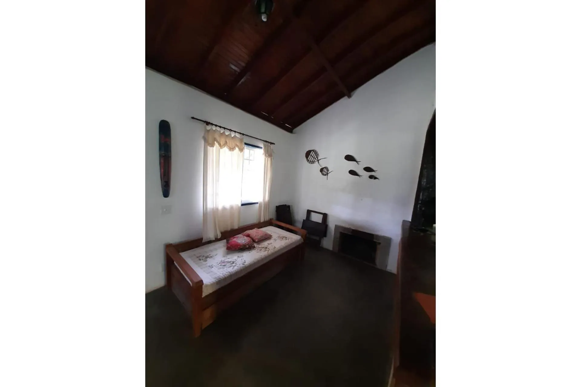 Living room, Bed in Pousada Chalé Terra Viva