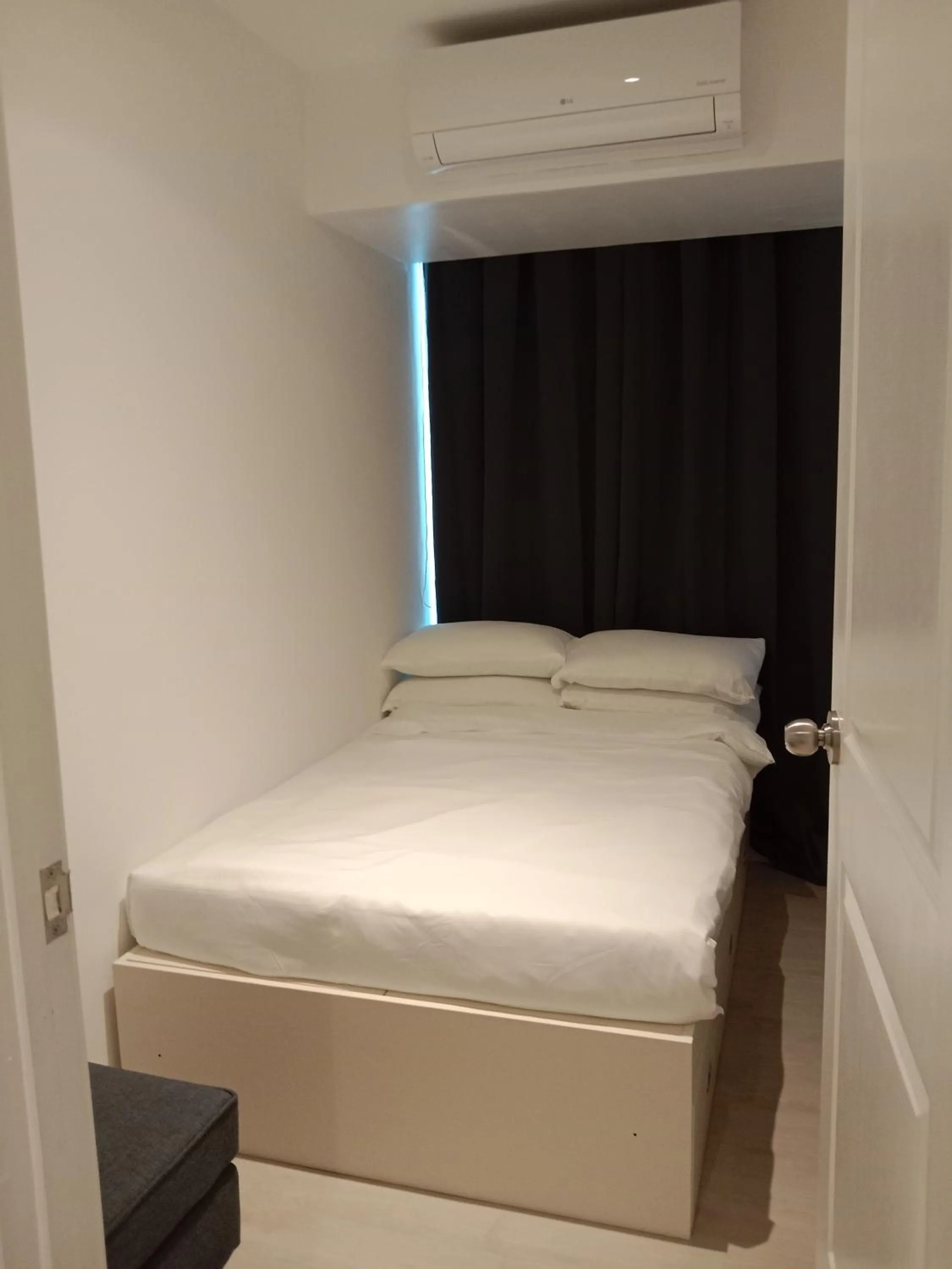 Bed in Azure Residences by Van Florendo