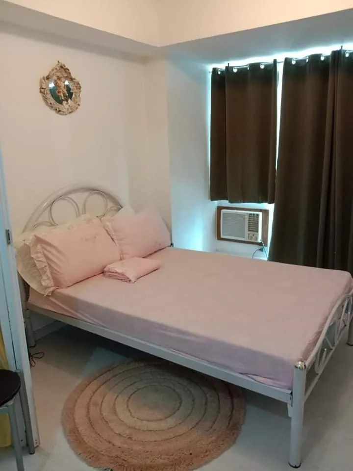 Bed in Azure Residences by Van Florendo