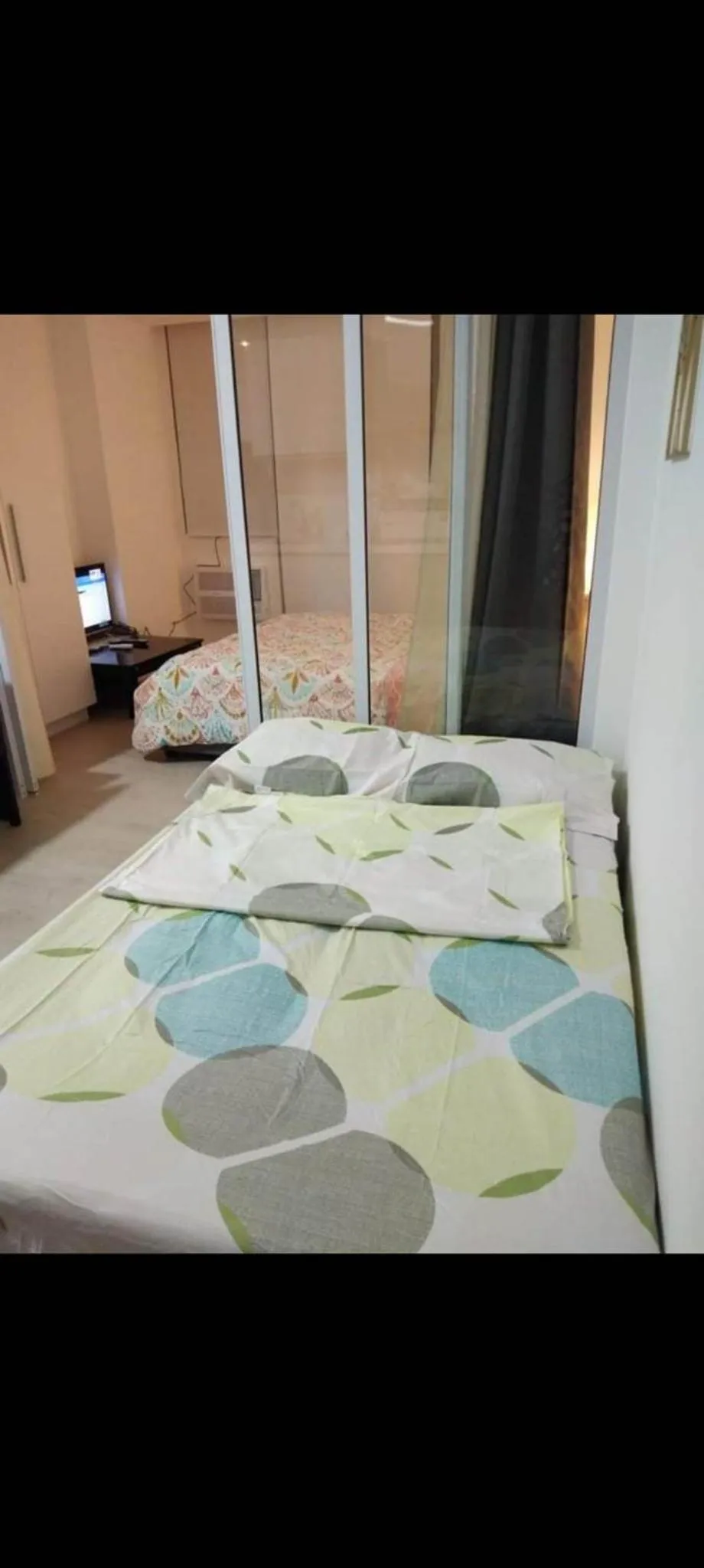 Bed in Azure Residences by Van Florendo