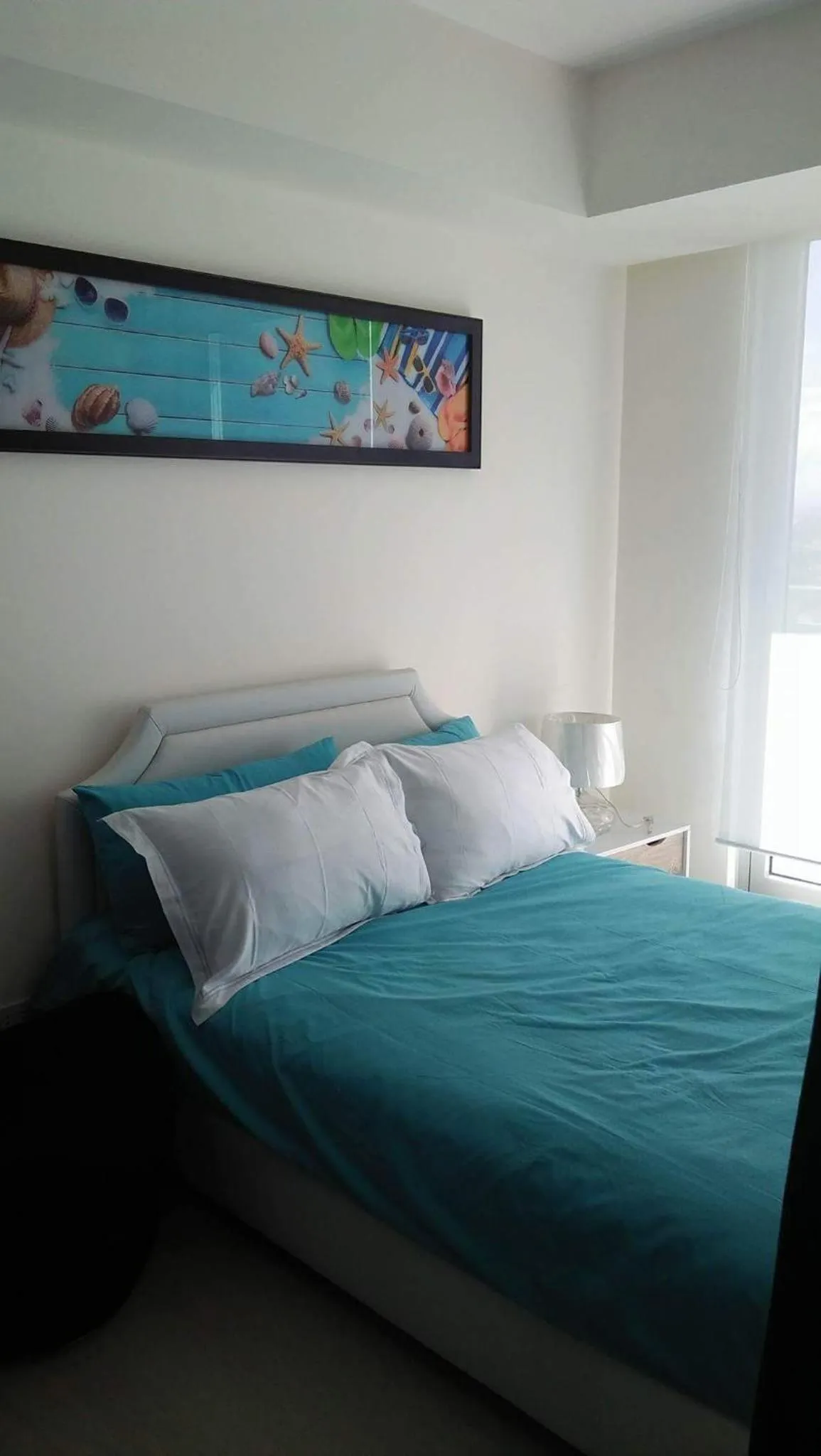 Bed in Azure Residences by Van Florendo