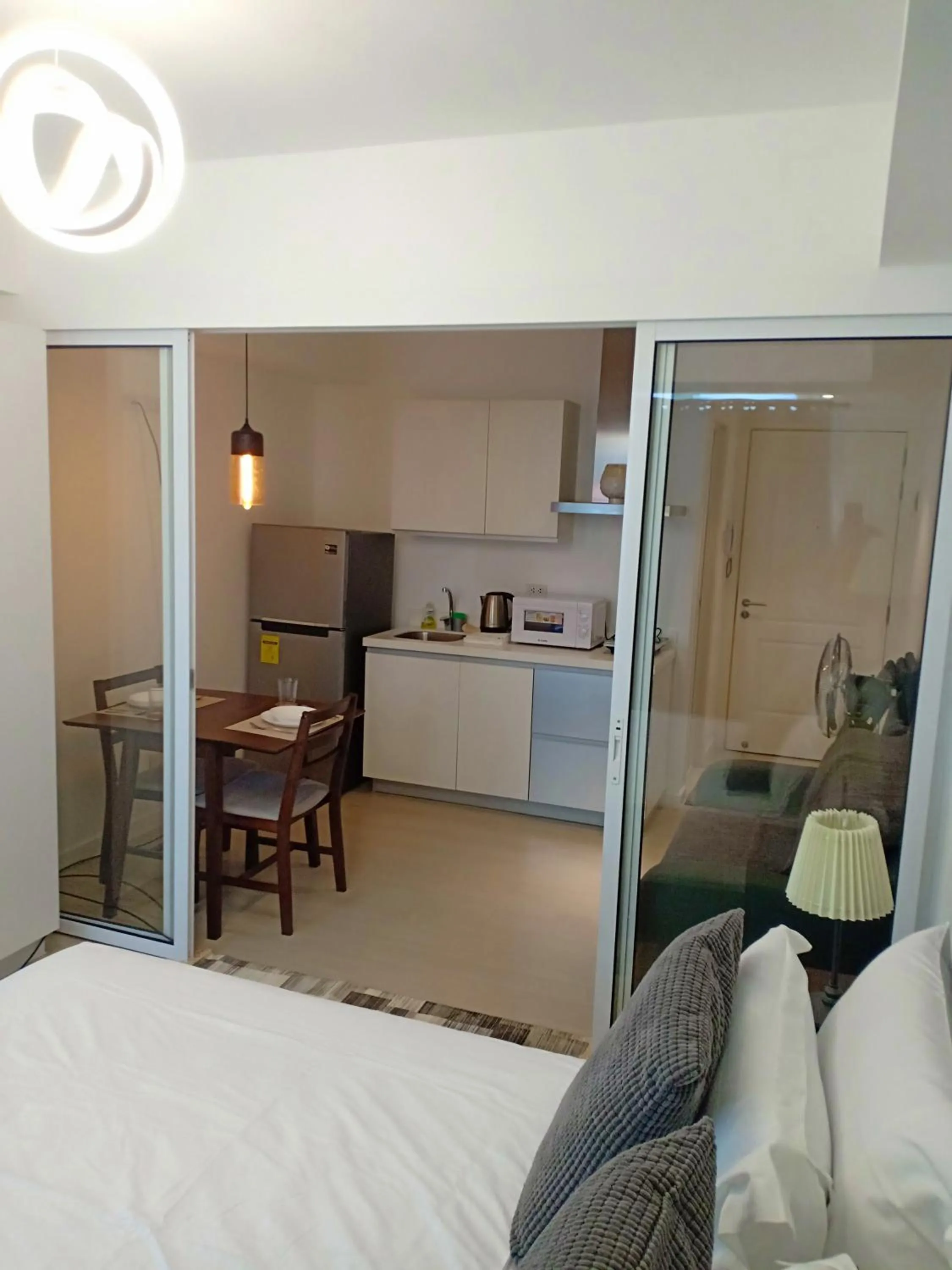 Bed in Azure Residences by Van Florendo