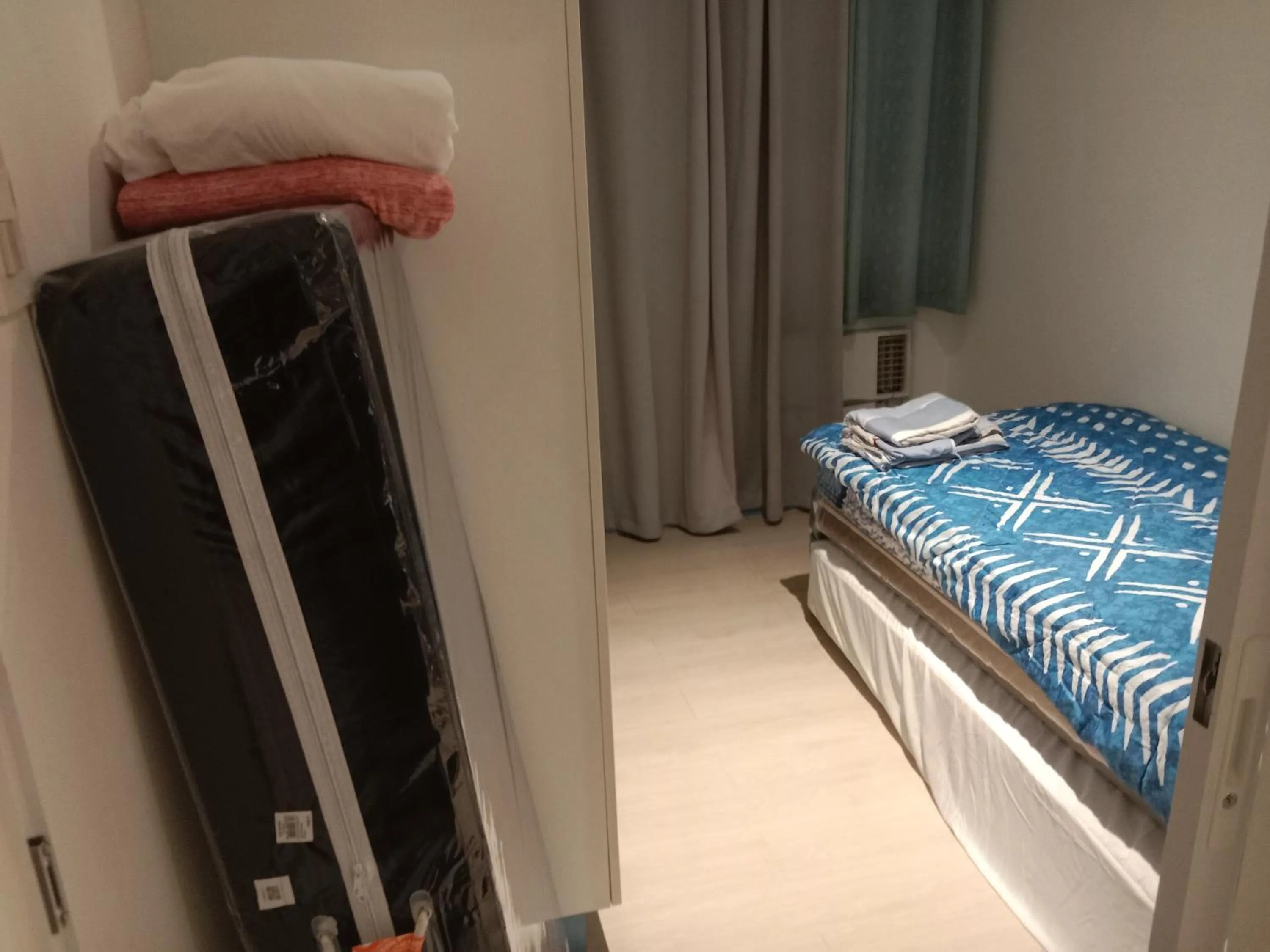 Bed in Azure Residences by Van Florendo