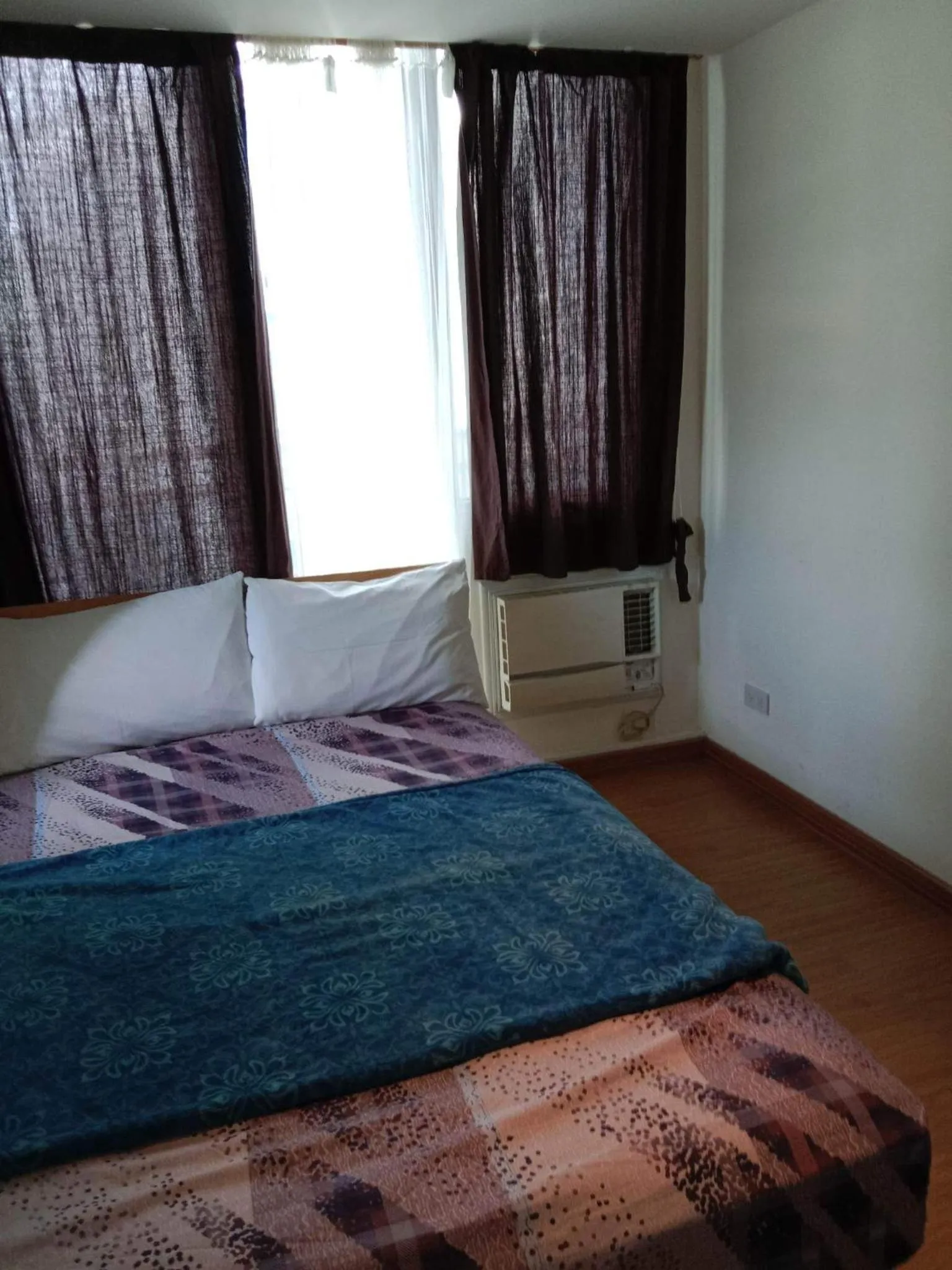 Bed in Azure Residences by Van Florendo