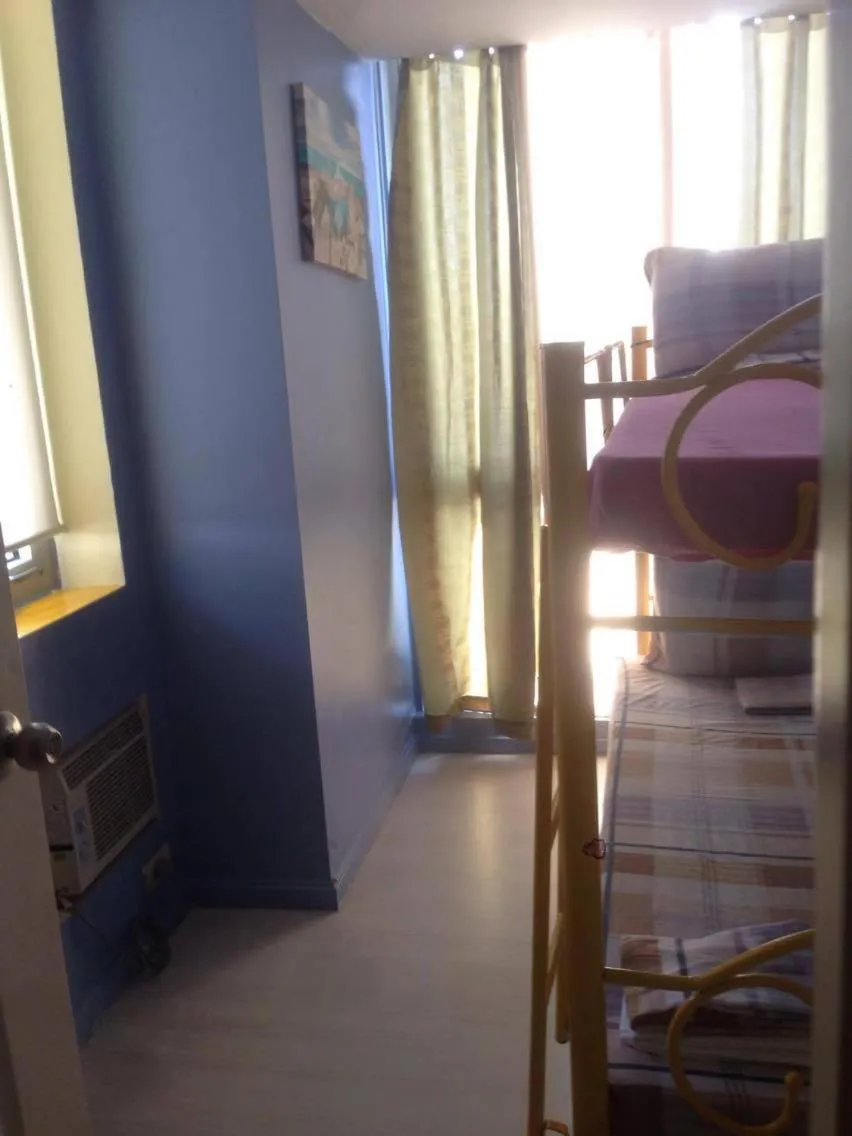 Bed in Azure Residences by Van Florendo