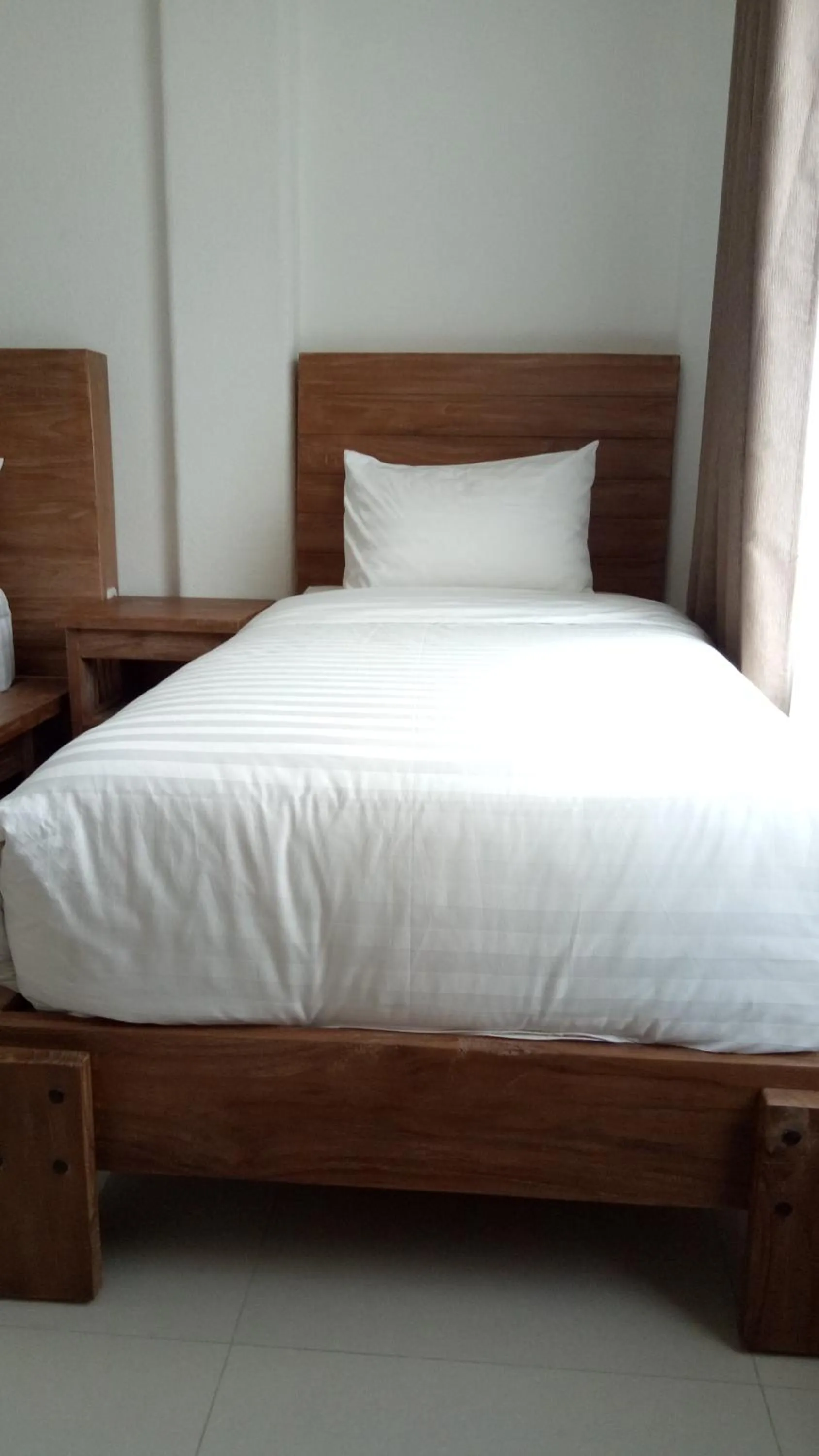 Bed in The 5 Brothers Hotel