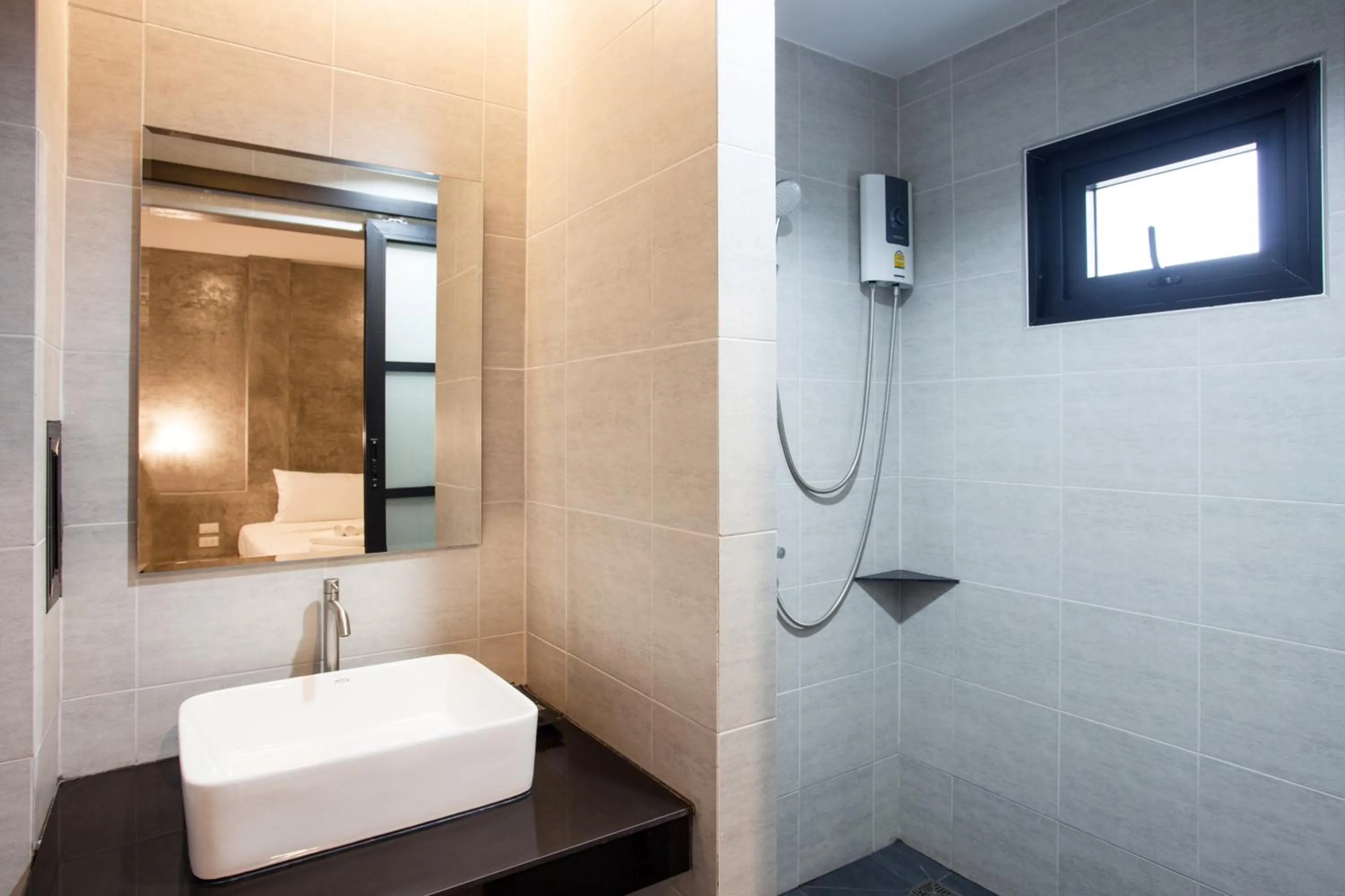 Shower in Ritsurin Boutique Hotel - โรงแรมริทสุริน บูติค