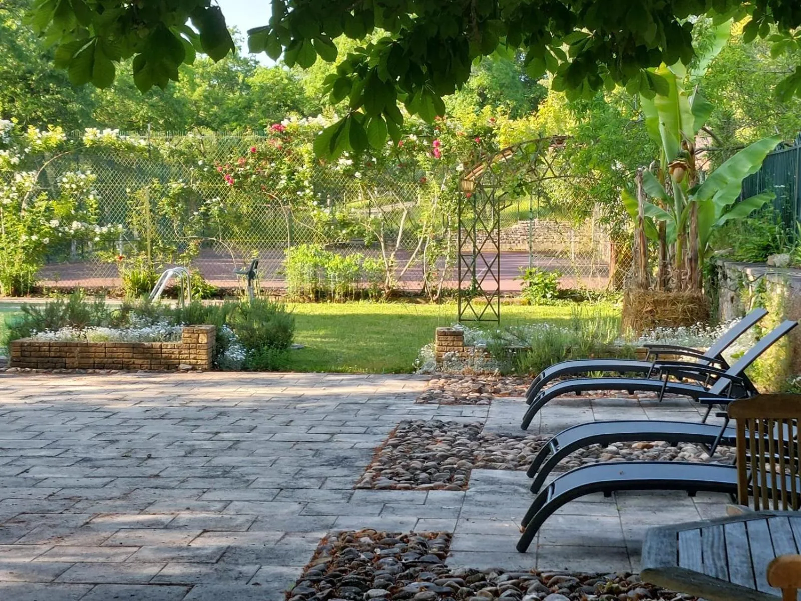 Swimming pool in Logis Hotels Domaine du Châtelard