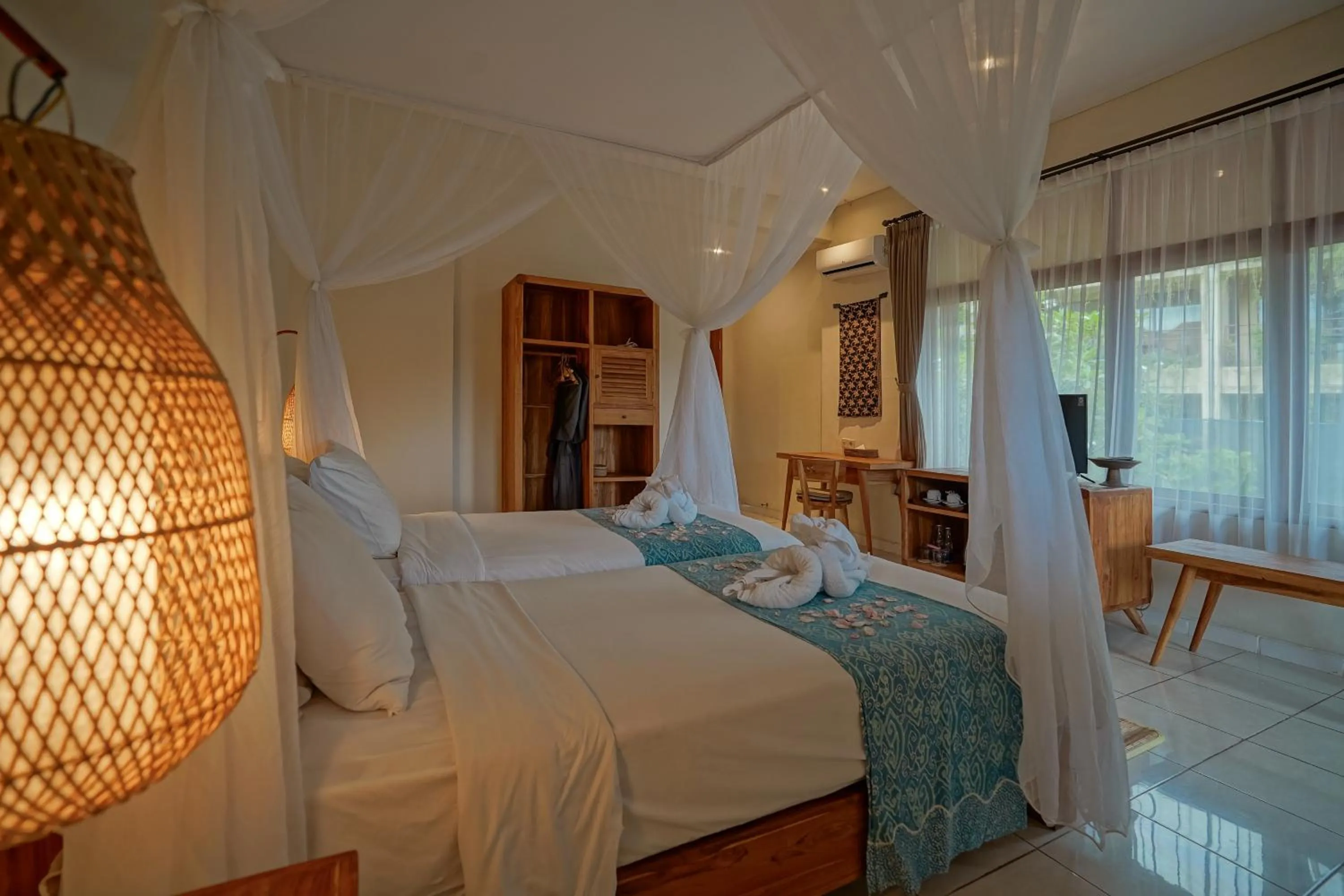 Bed in Pertiwi Resort & Spa