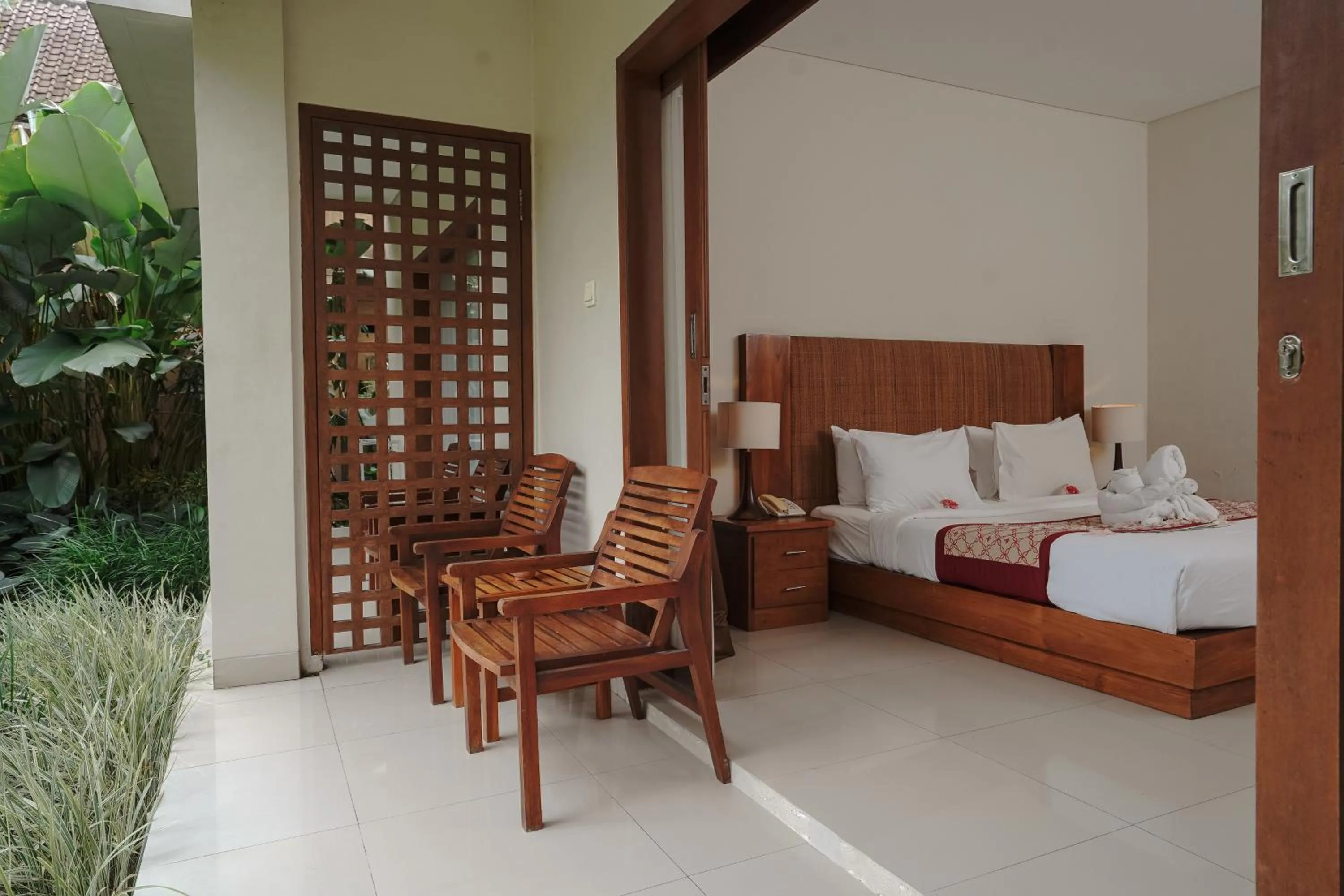Balcony/Terrace, Bed in Pertiwi Resort & Spa