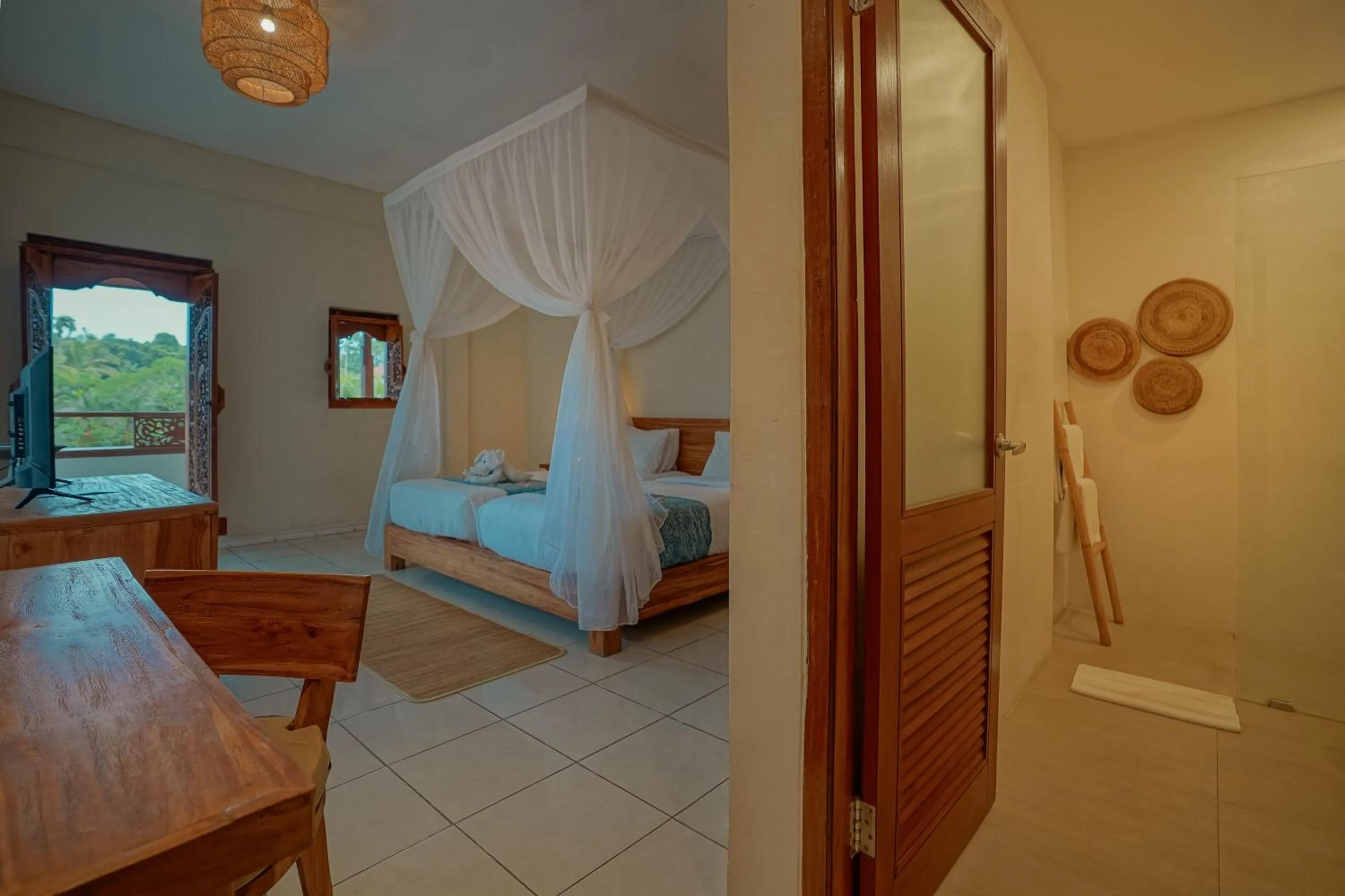 Bed in Pertiwi Resort & Spa