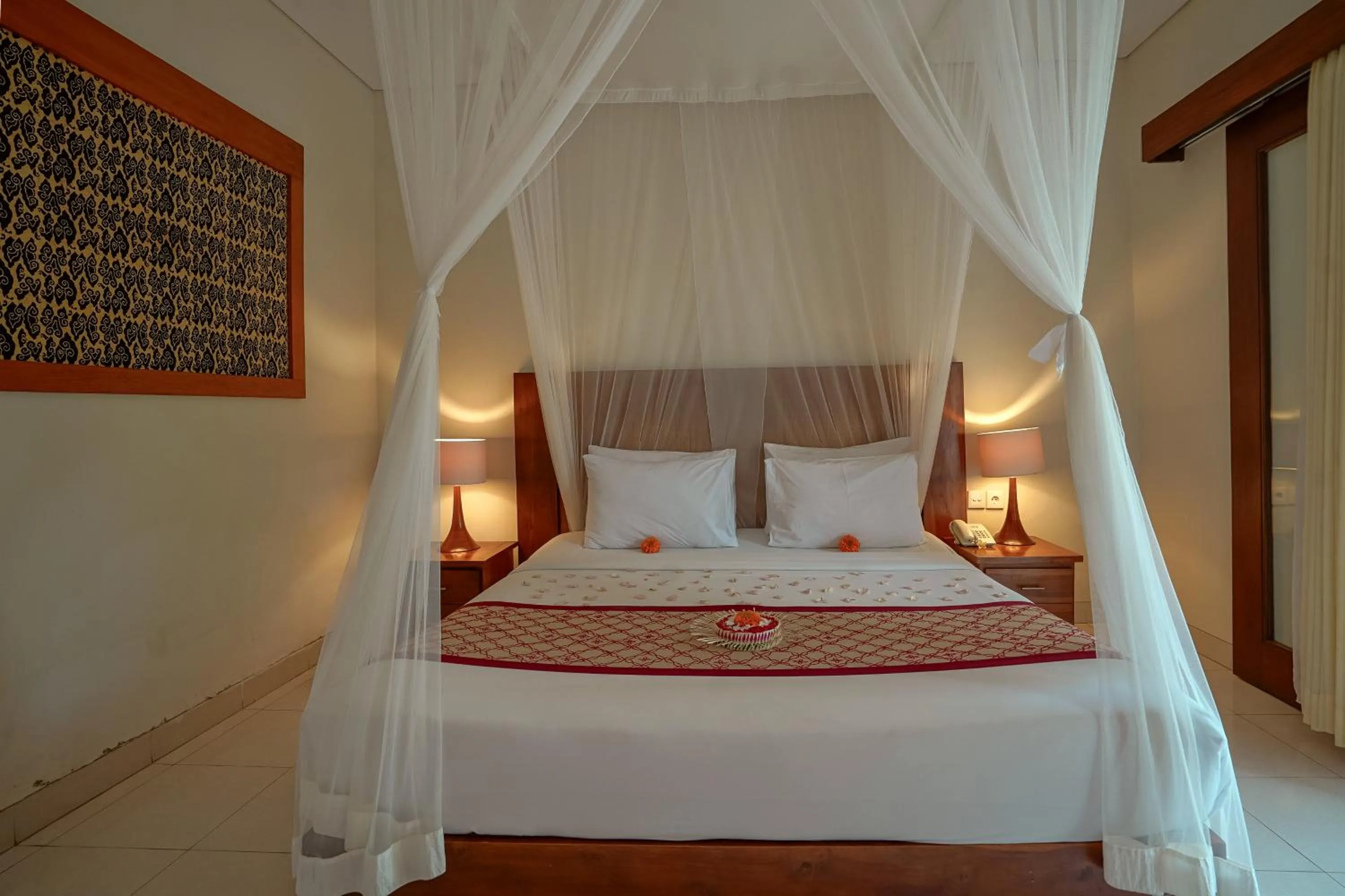 Bed in Pertiwi Resort & Spa