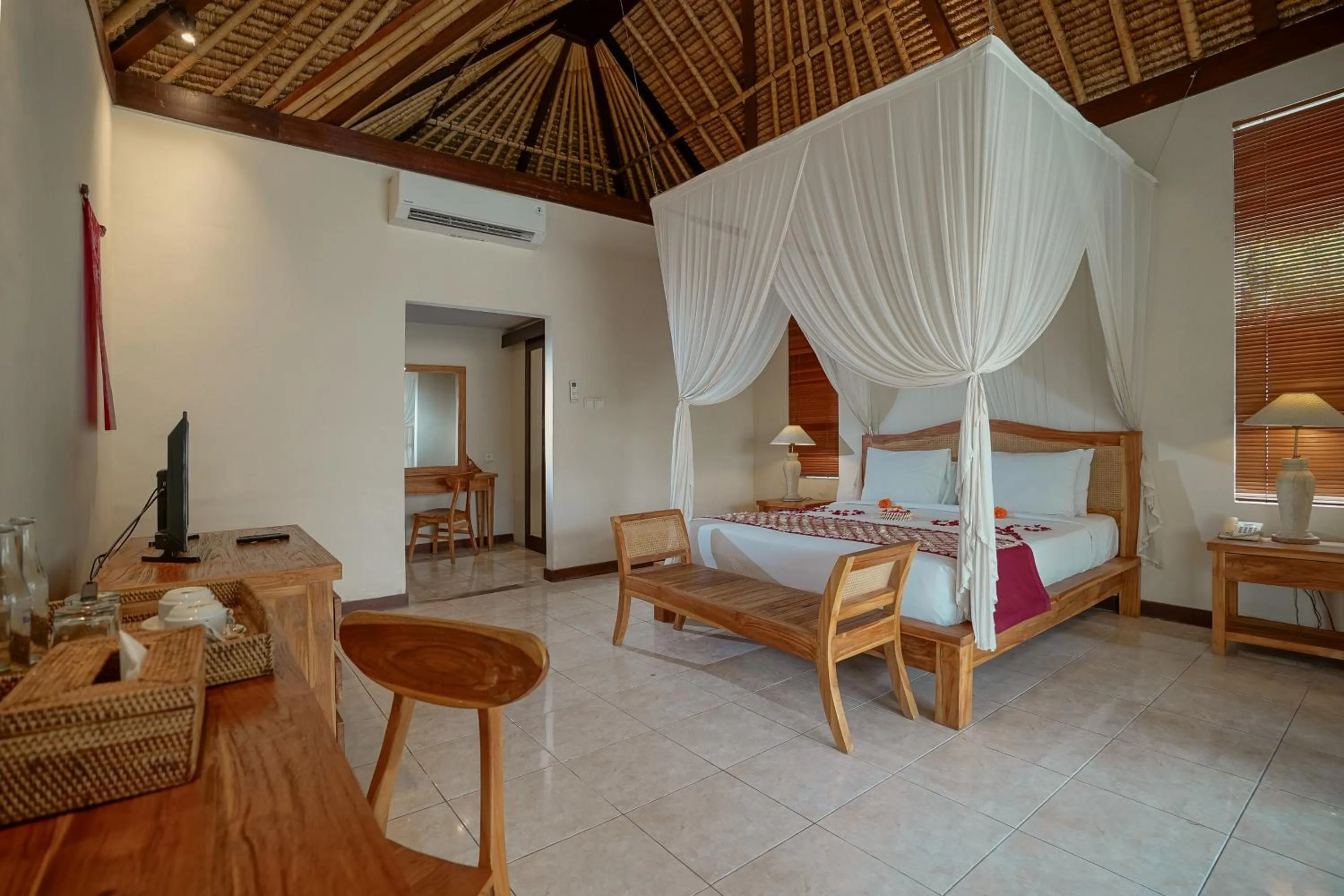 Bed in Pertiwi Resort & Spa