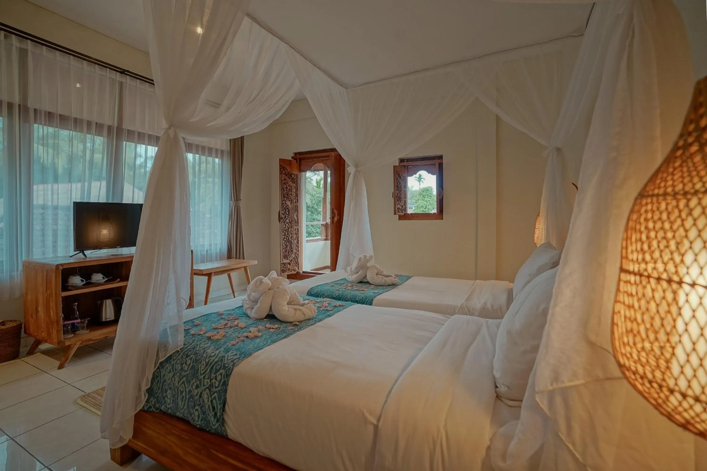 Bed in Pertiwi Resort & Spa