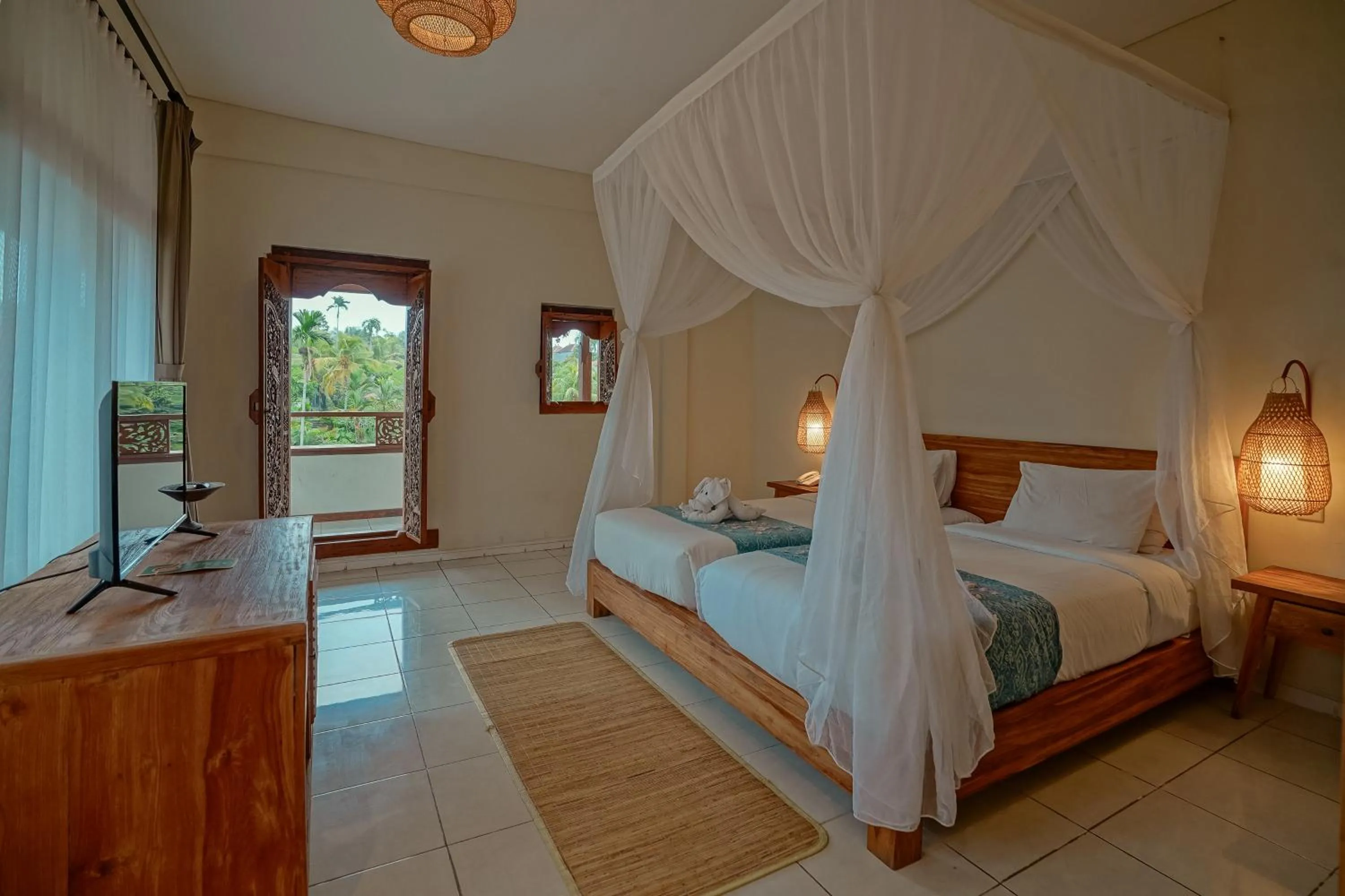 Bed in Pertiwi Resort & Spa