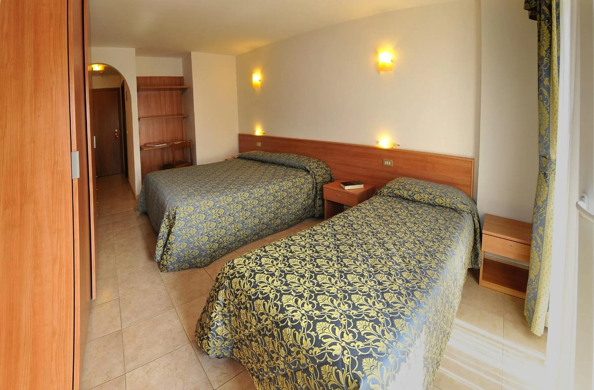 Quadruple Room in Hotel Alpen