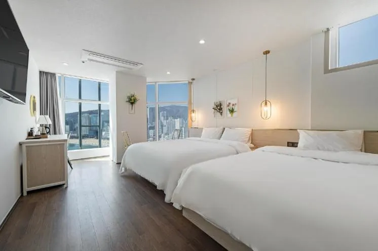 Bed in Gwangalli Hotel primavera in Busan