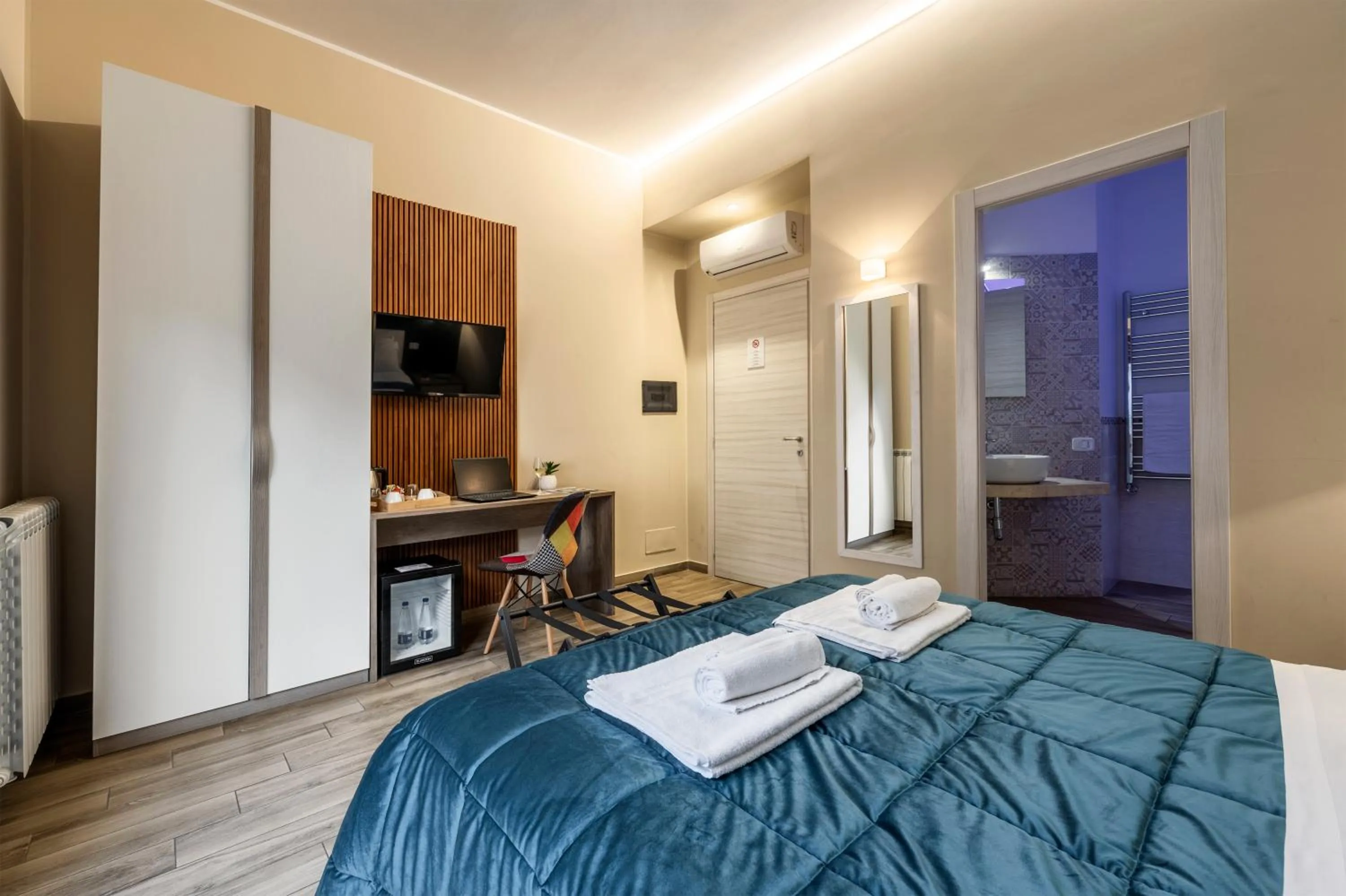 Bed in Quinto Stabile Rooms&Suite