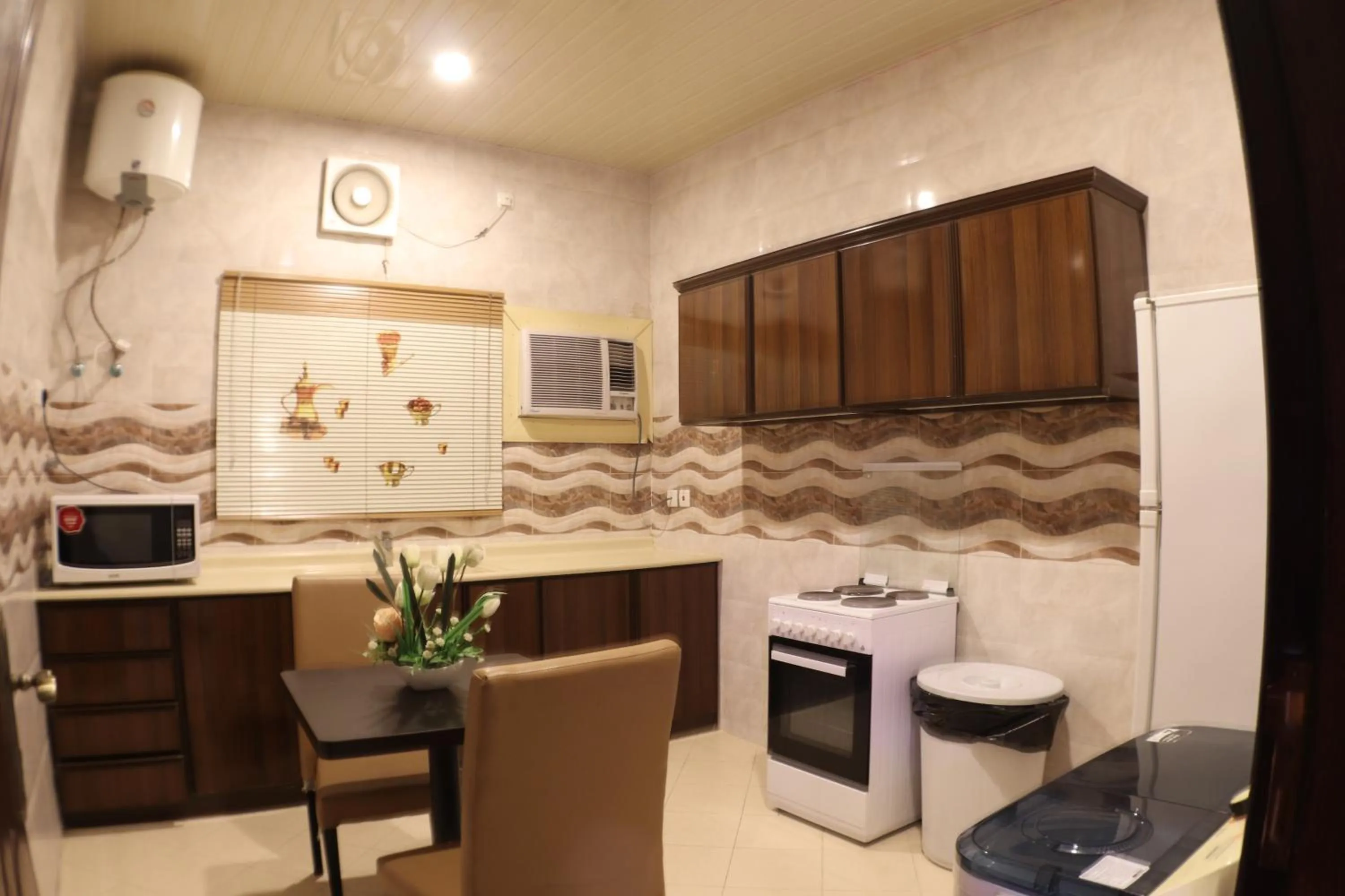 Kitchen or kitchenette in شقق سوات للشقق المخدومة