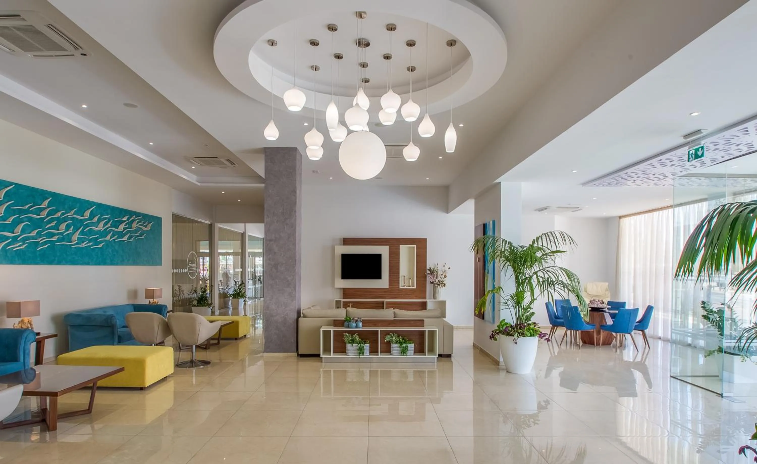 Communal lounge/ TV room in Stamatia Hotel