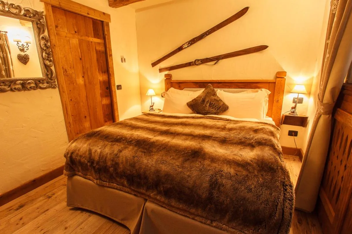 Bed in Au Coeur Des Neiges Resort SPA & FREE E-BIKE