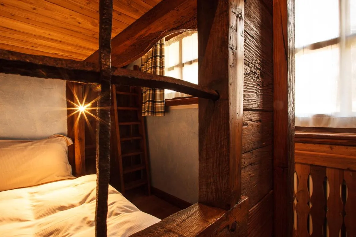 Bed in Au Coeur Des Neiges Resort SPA & FREE E-BIKE