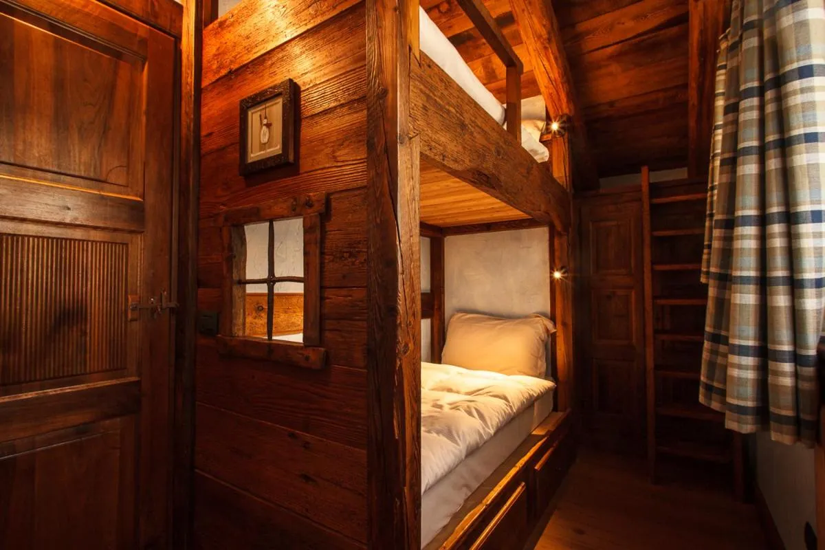 Bed in Au Coeur Des Neiges Resort SPA & FREE E-BIKE