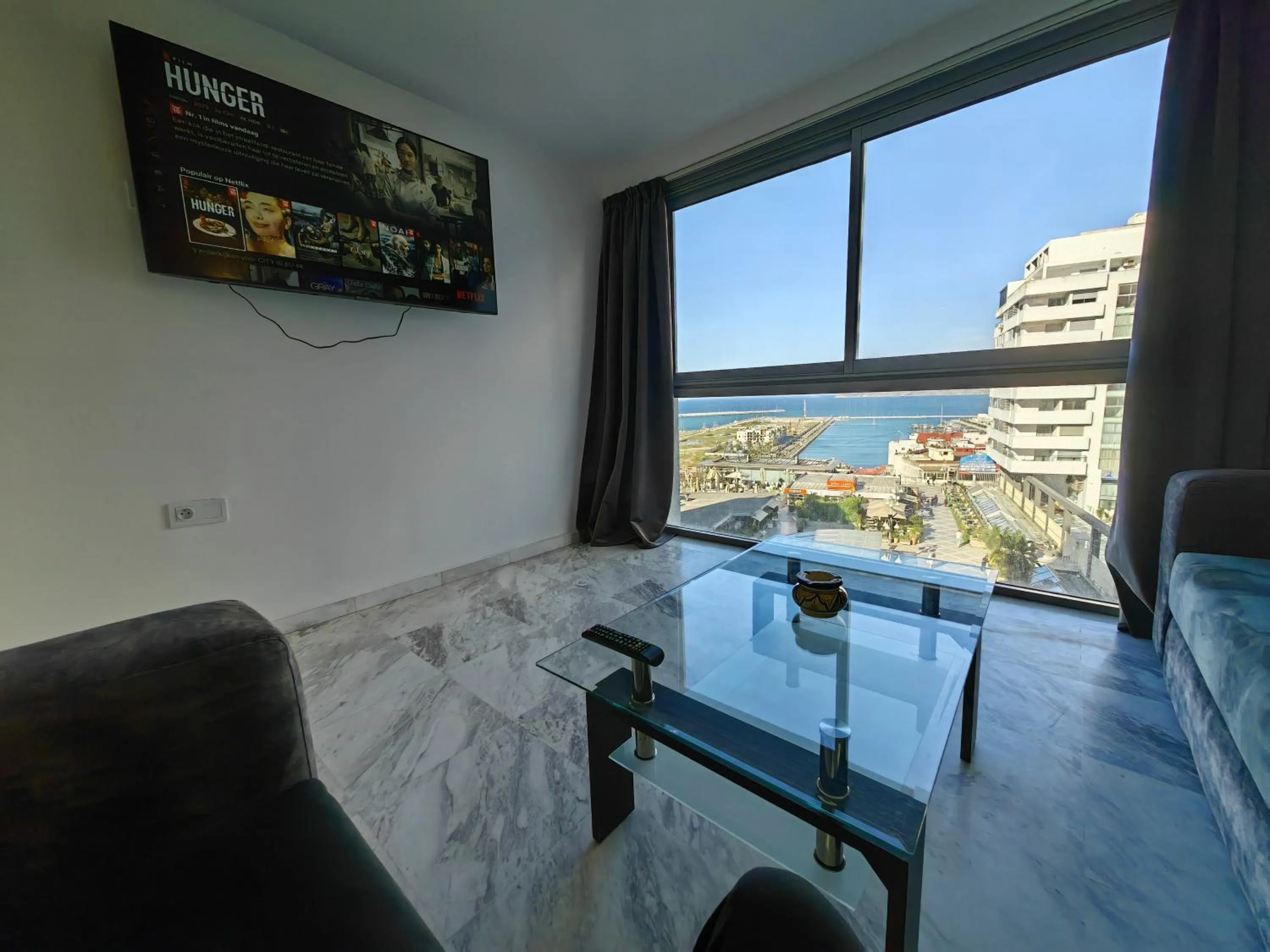 Communal lounge/ TV room in City Bleu Maroc