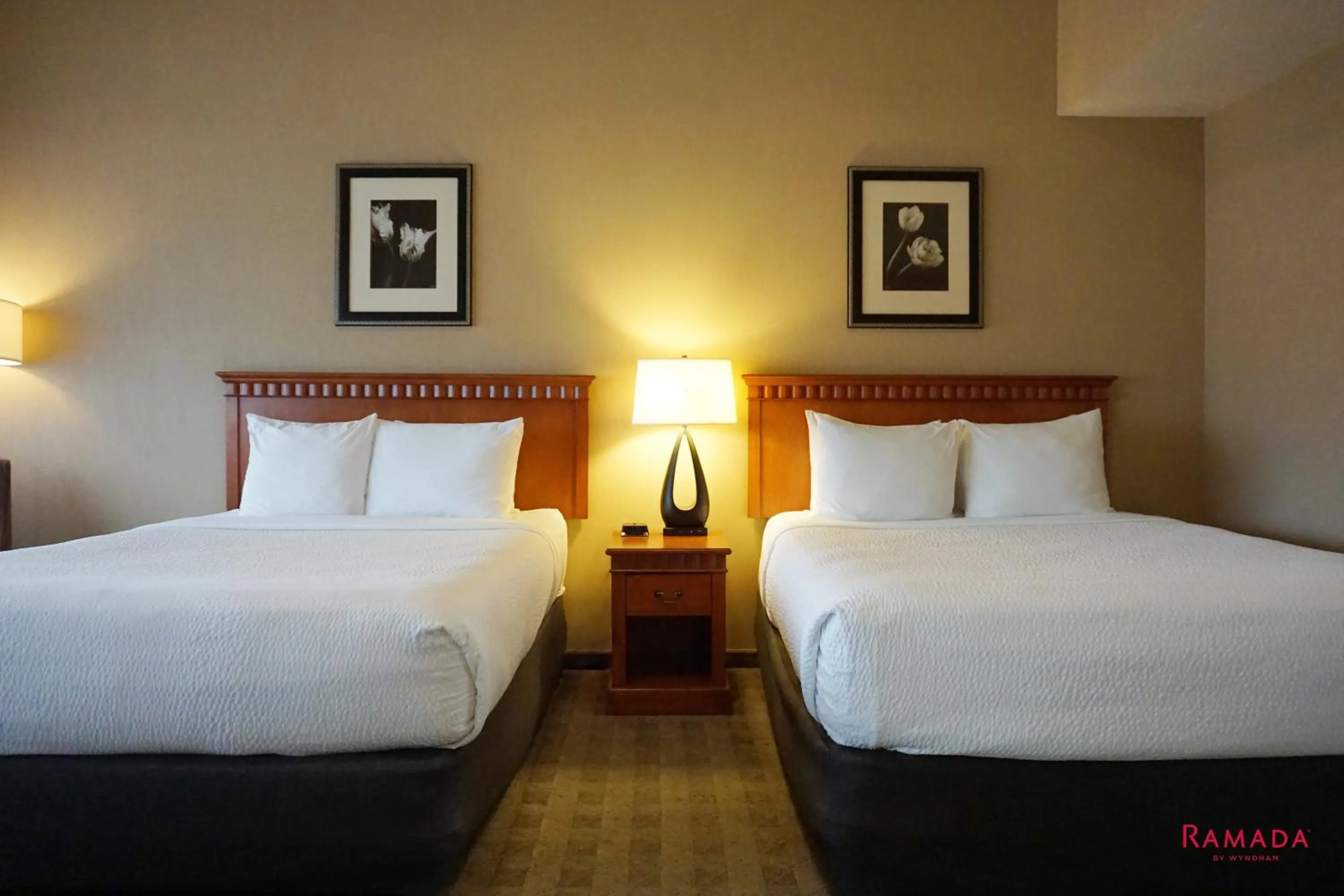 Bed in Ramada by Wyndham Kelowna Hotel & Conference Center