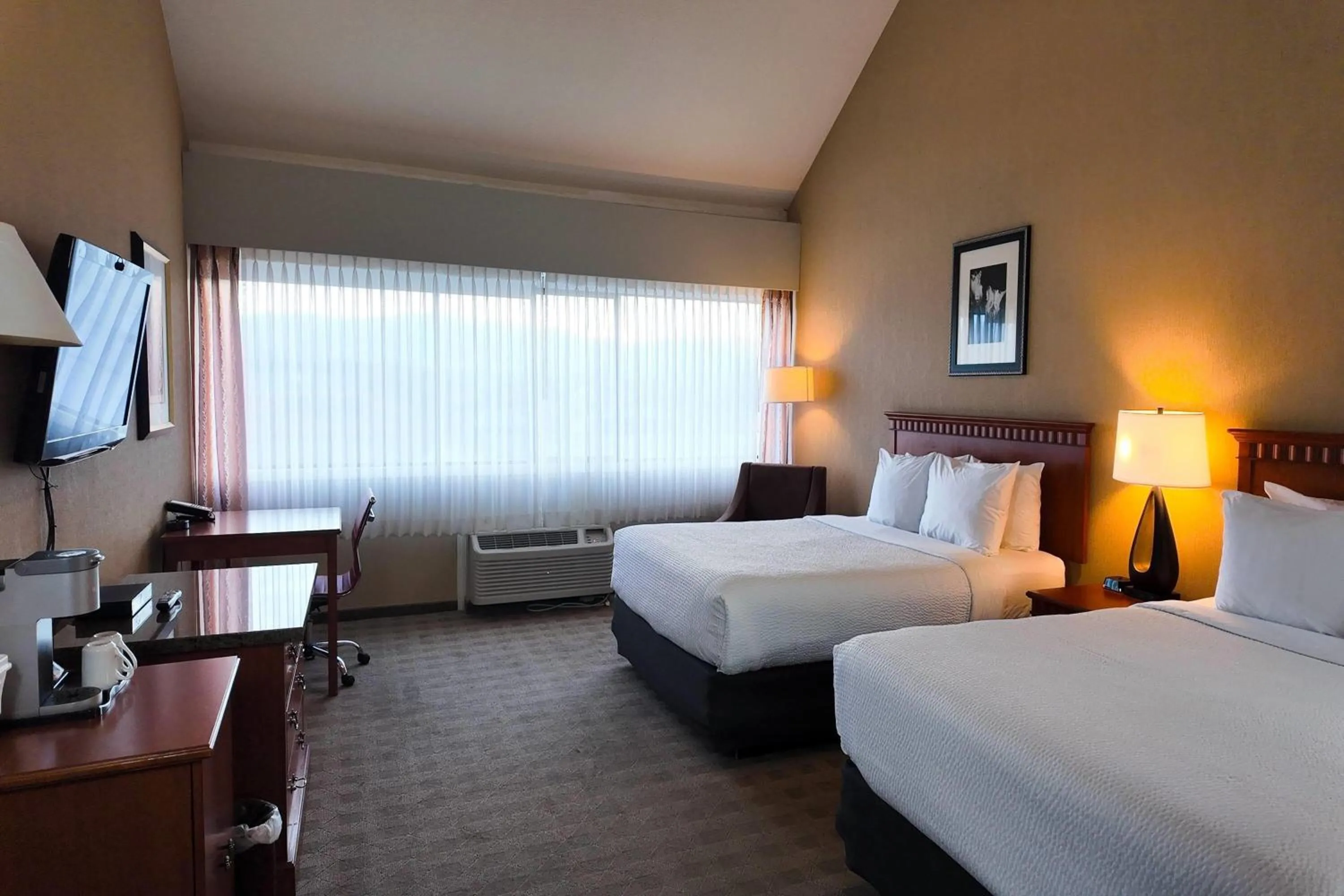 Photo of the whole room, Bed in Ramada by Wyndham Kelowna Hotel & Conference Center