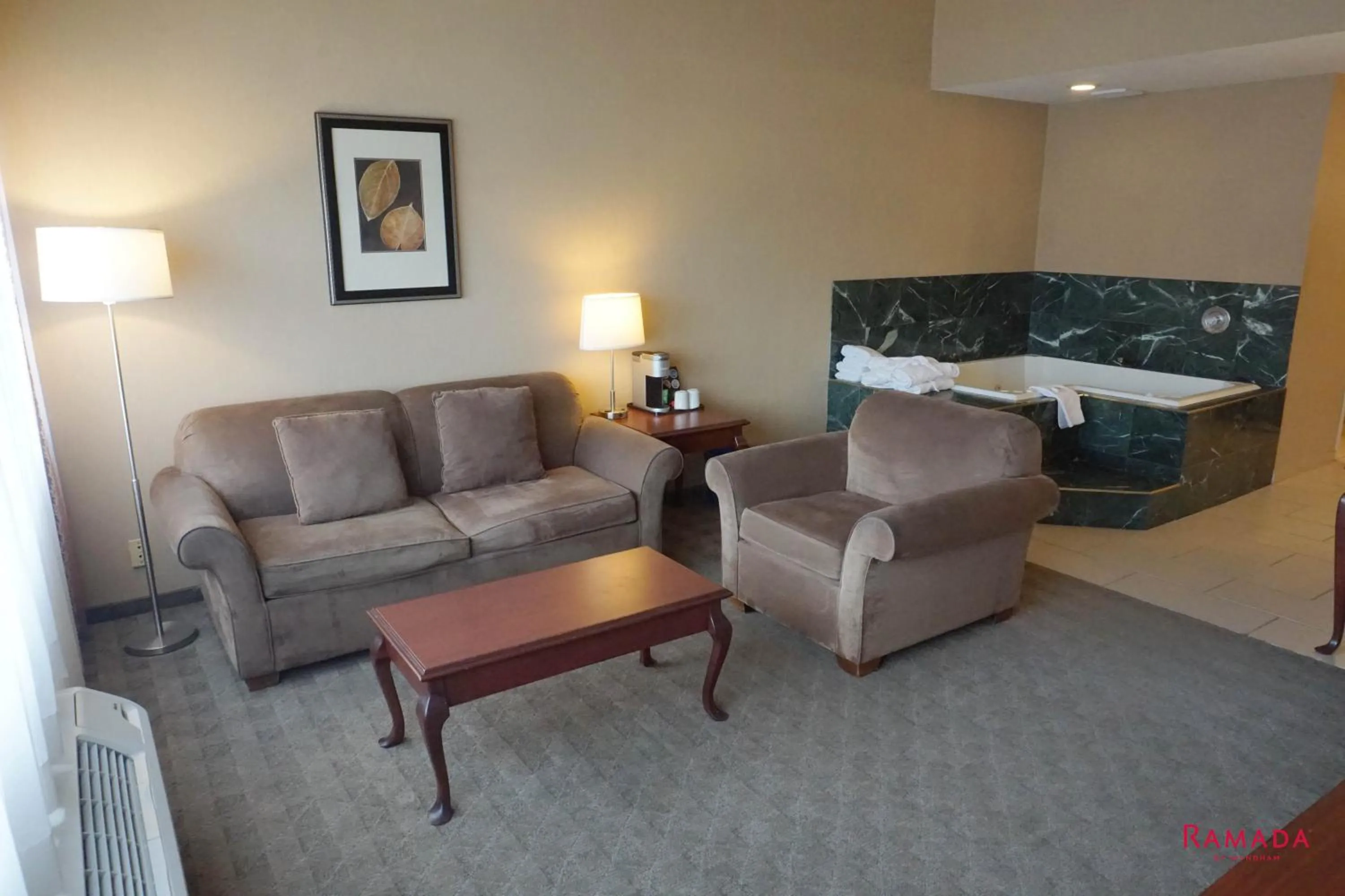 Bed in Ramada by Wyndham Kelowna Hotel & Conference Center