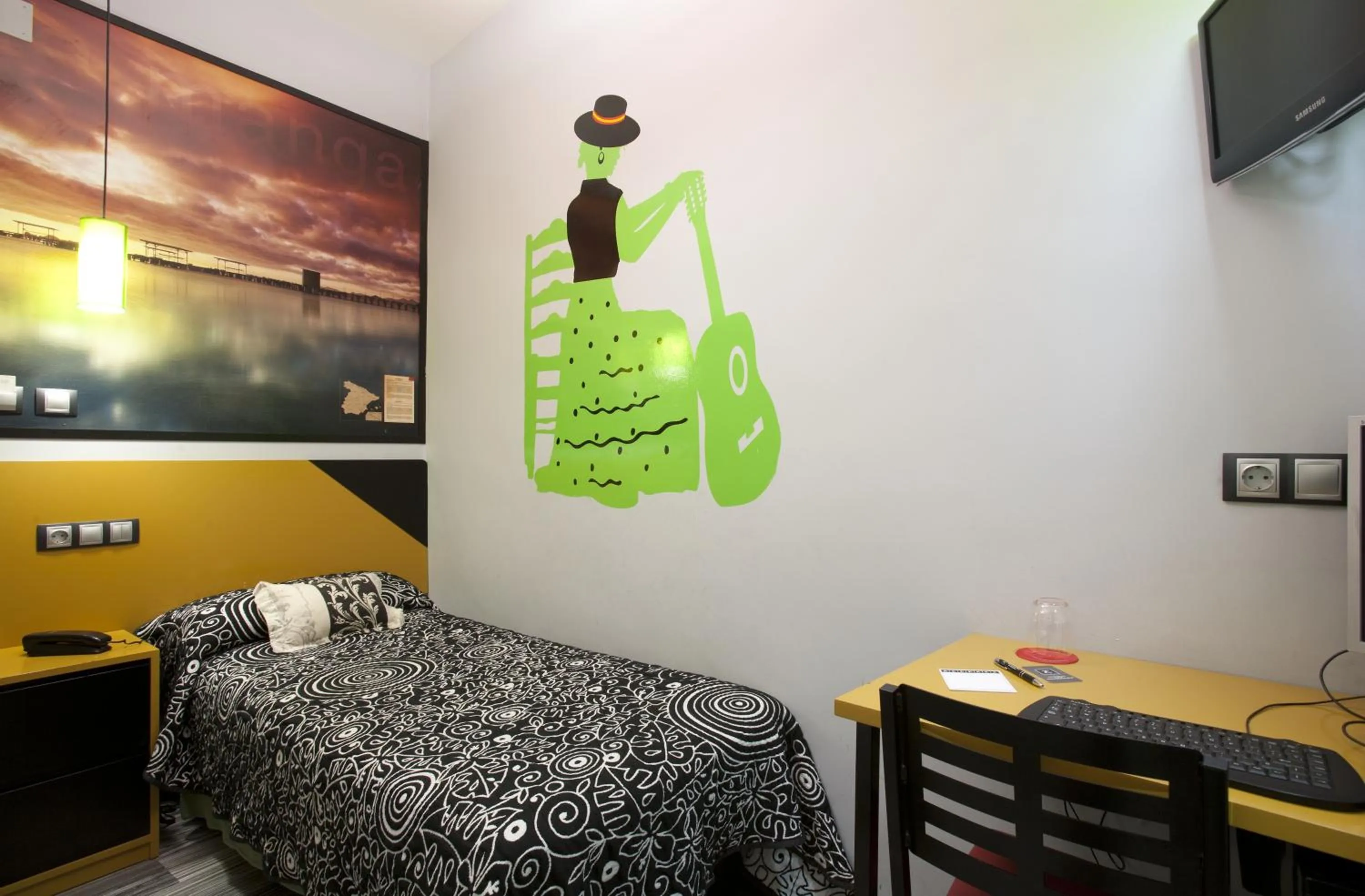 Bed in JC Rooms Santa Ana