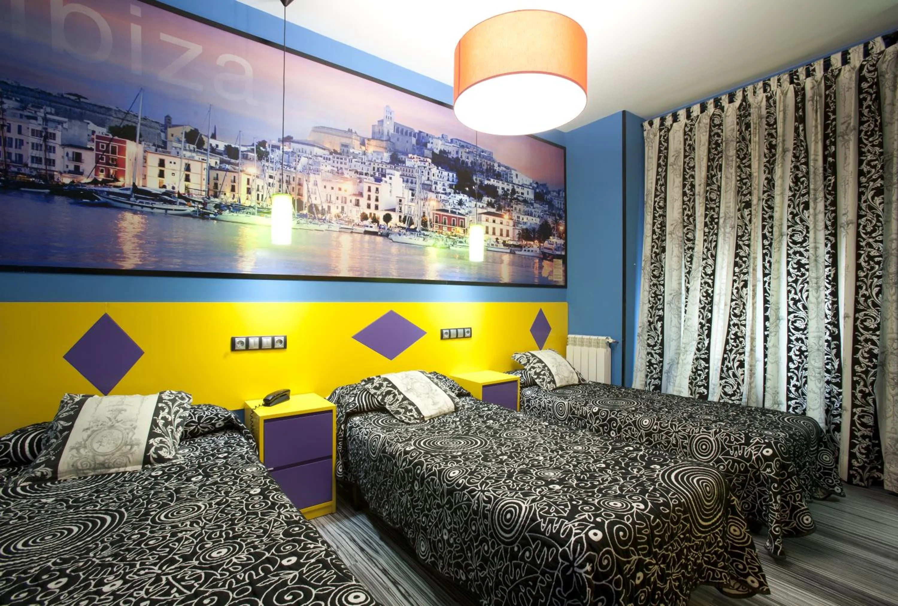 Bed in JC Rooms Santa Ana