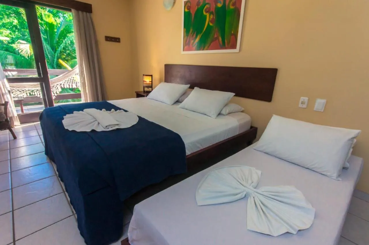 Photo of the whole room, Bed in Porto Zarpa Hotel