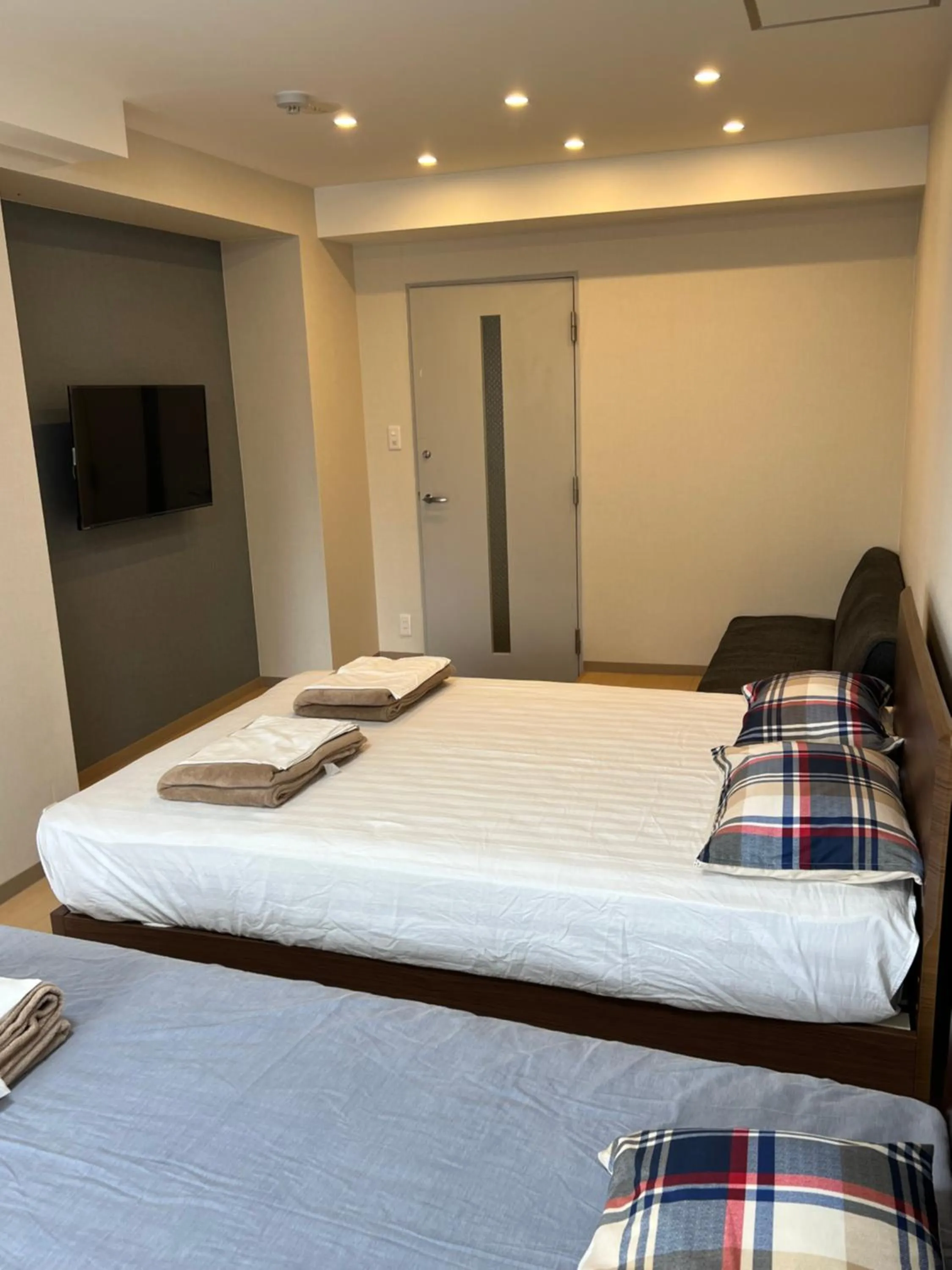Bed in Atami Onsen Guest House Megumi 5 minutes walk from Atami Station