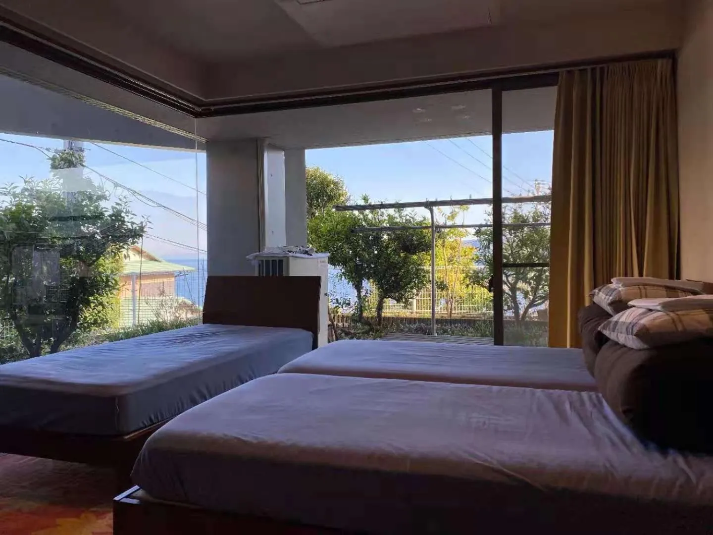 Bed in Atami Onsen Guest House Megumi 5 minutes walk from Atami Station