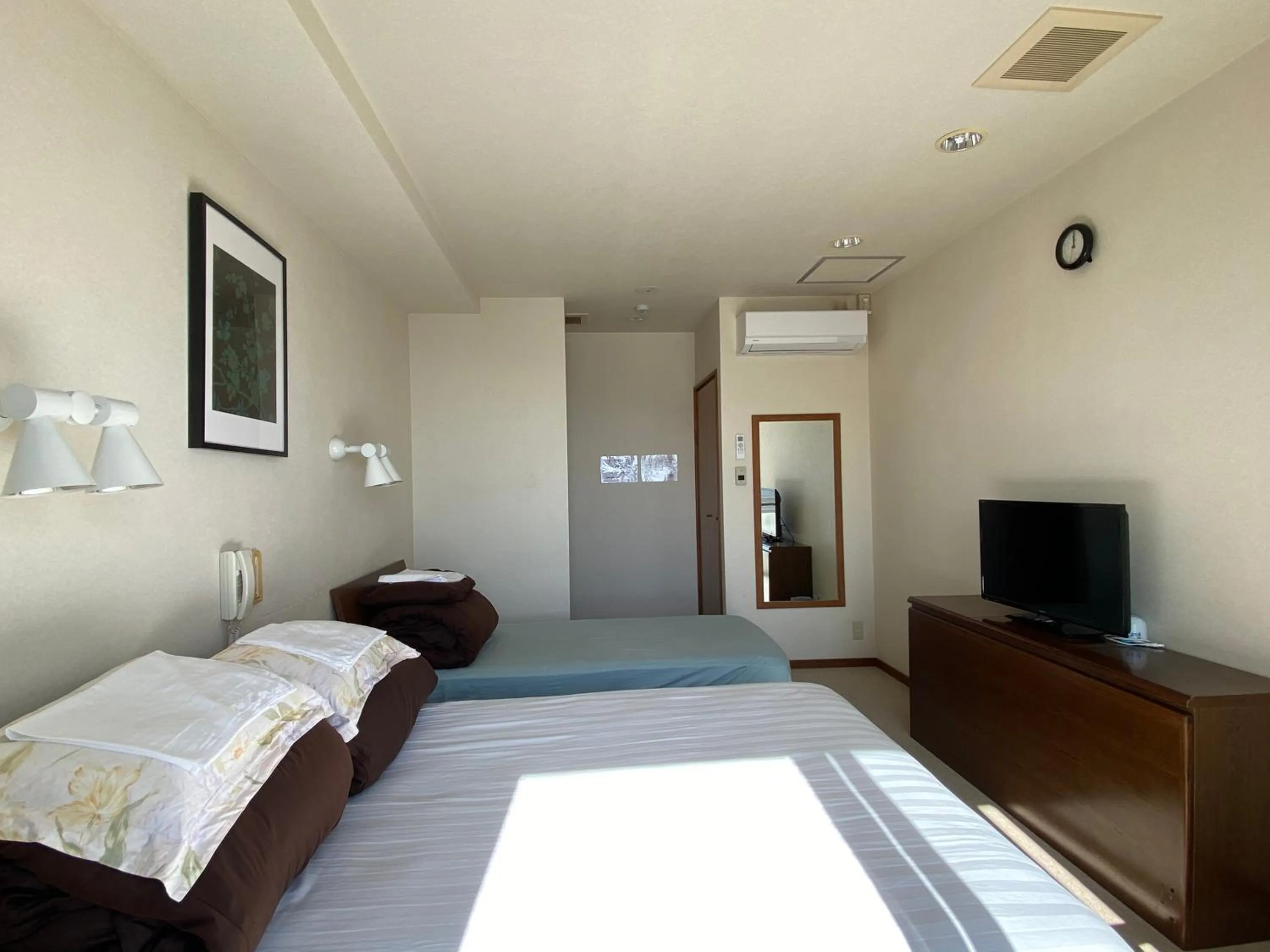 Bed in Atami Onsen Guest House Megumi 5 minutes walk from Atami Station