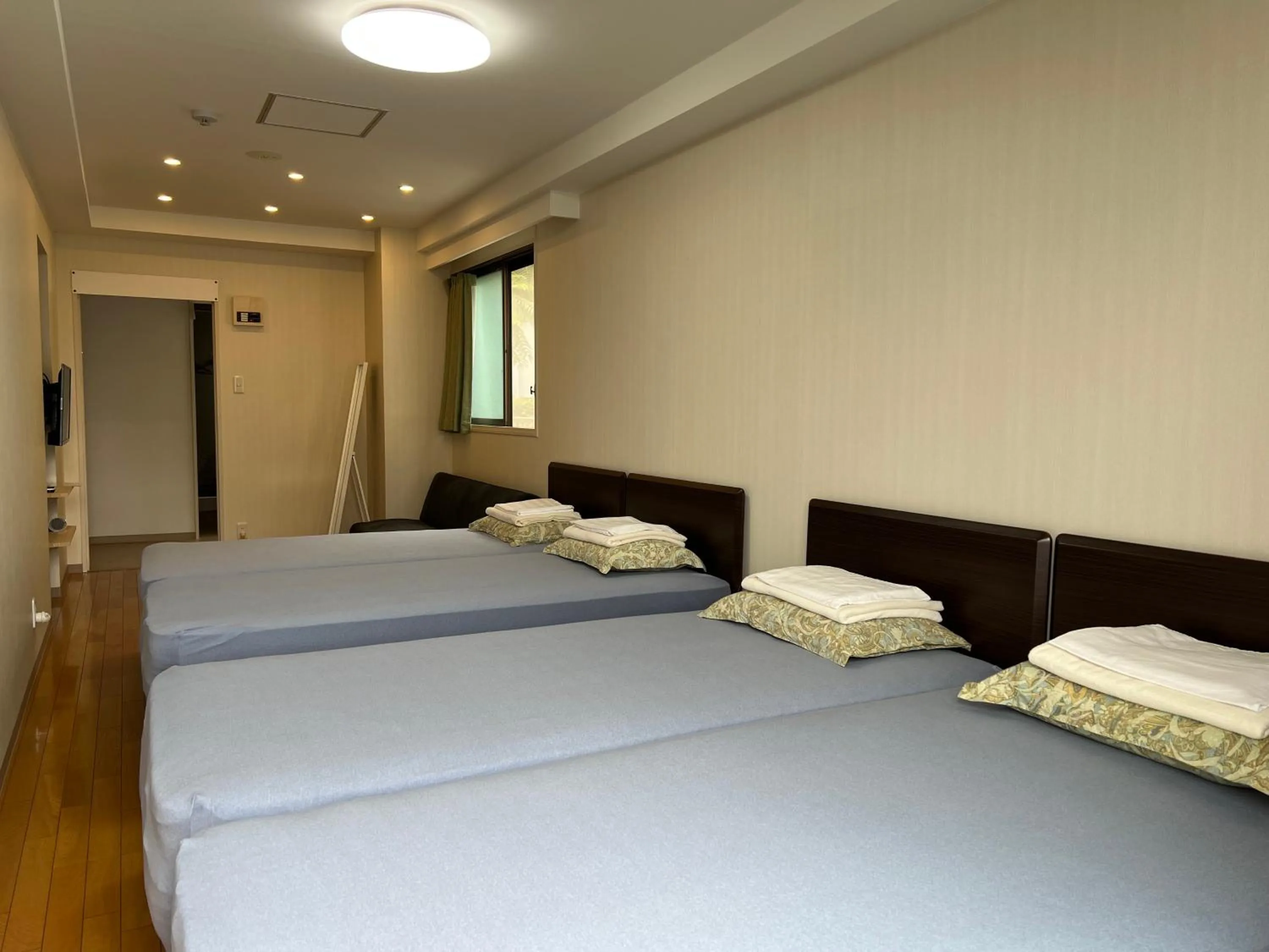 Bed in Atami Onsen Guest House Megumi 5 minutes walk from Atami Station