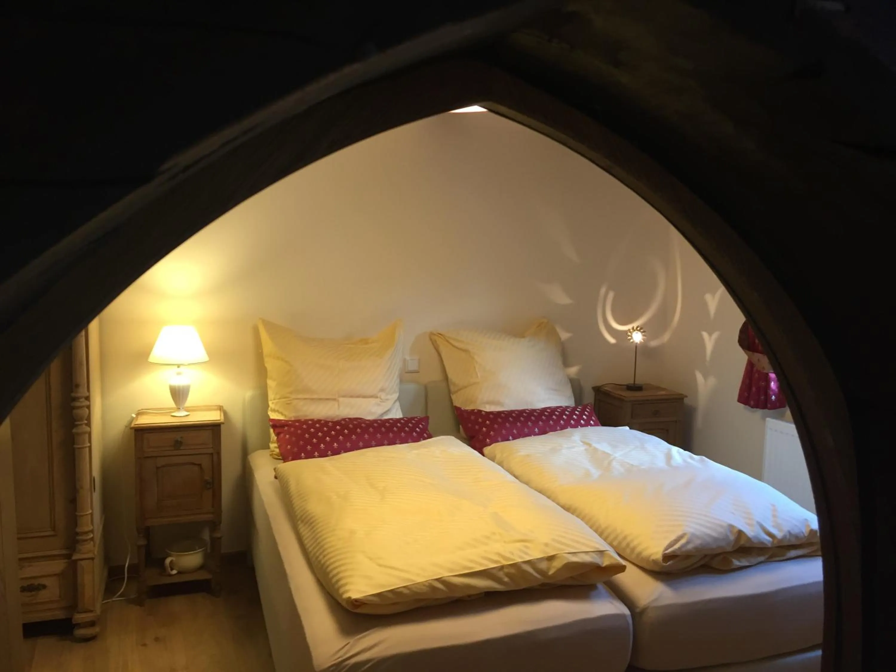 View (from property/room), Bed in McMüller's Kemenate Fulda