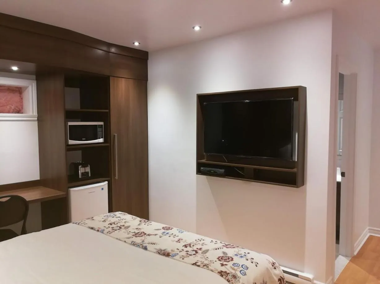 Bed in Motel Chez Nous