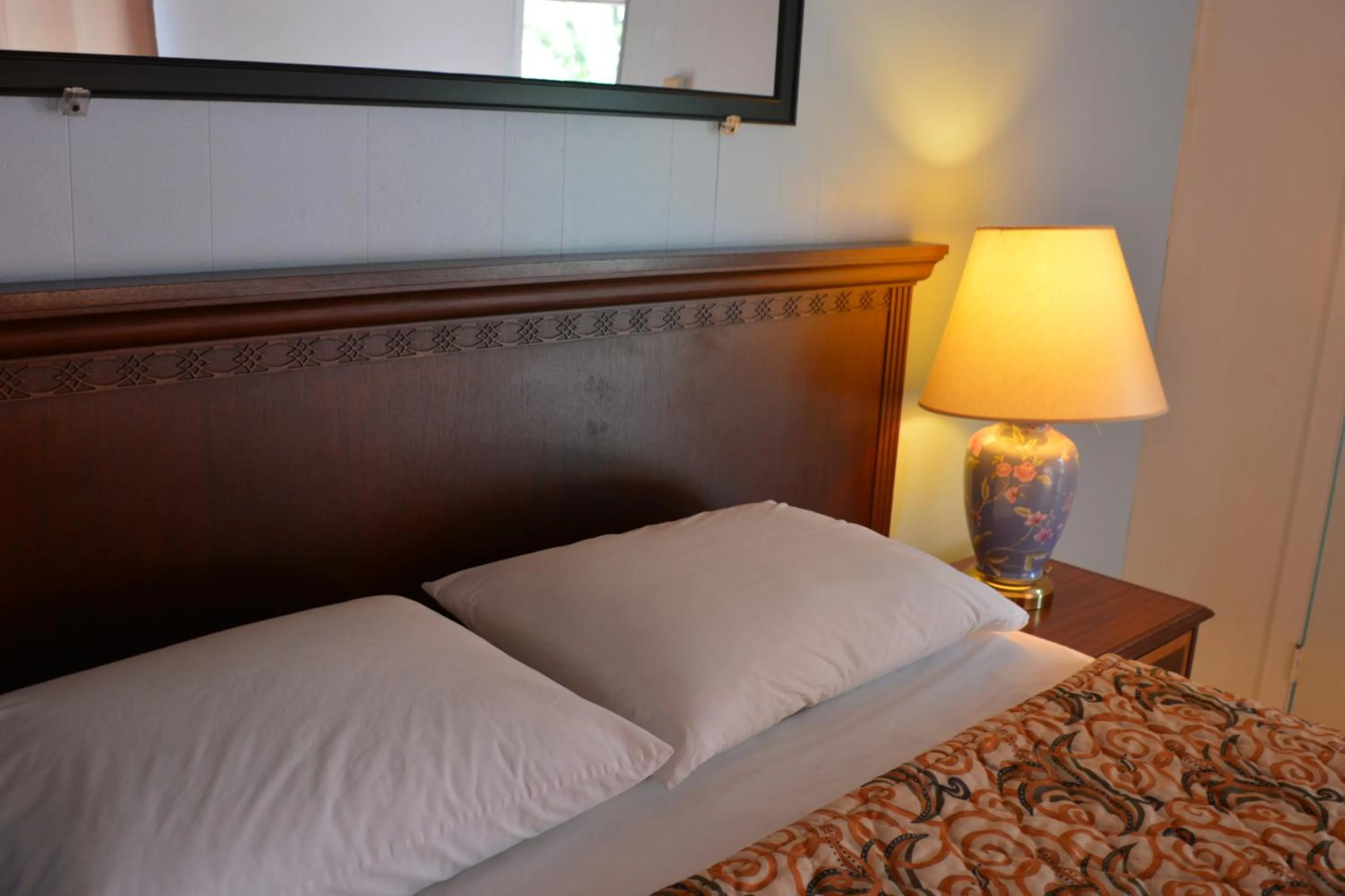 Bed in Motel Chez Nous