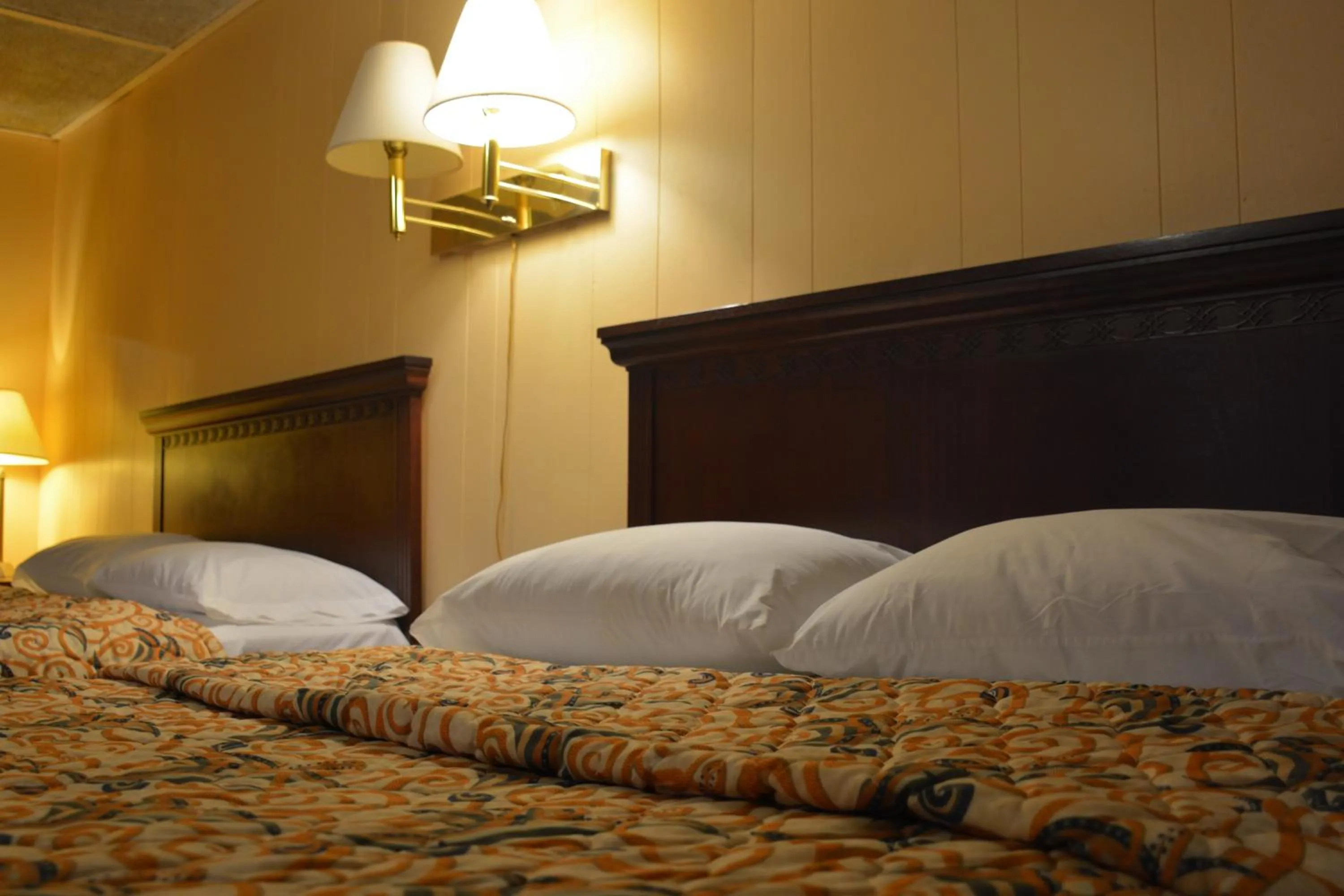 Bed in Motel Chez Nous