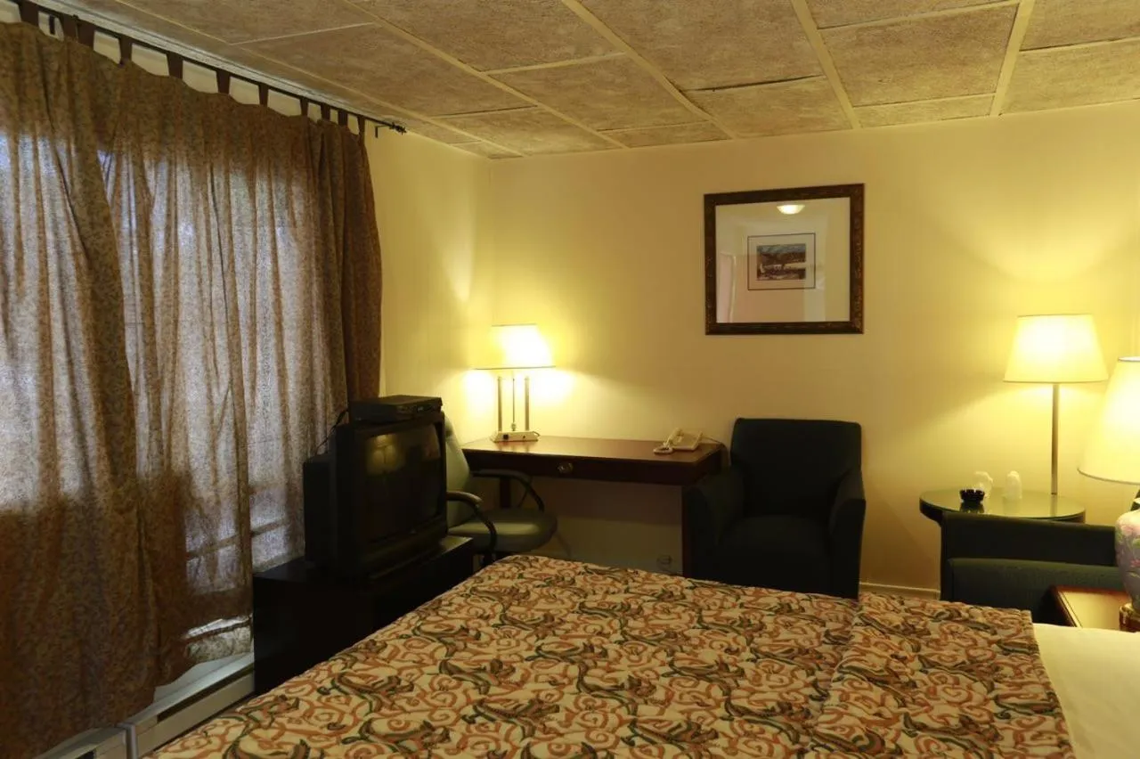 Bed in Motel Chez Nous