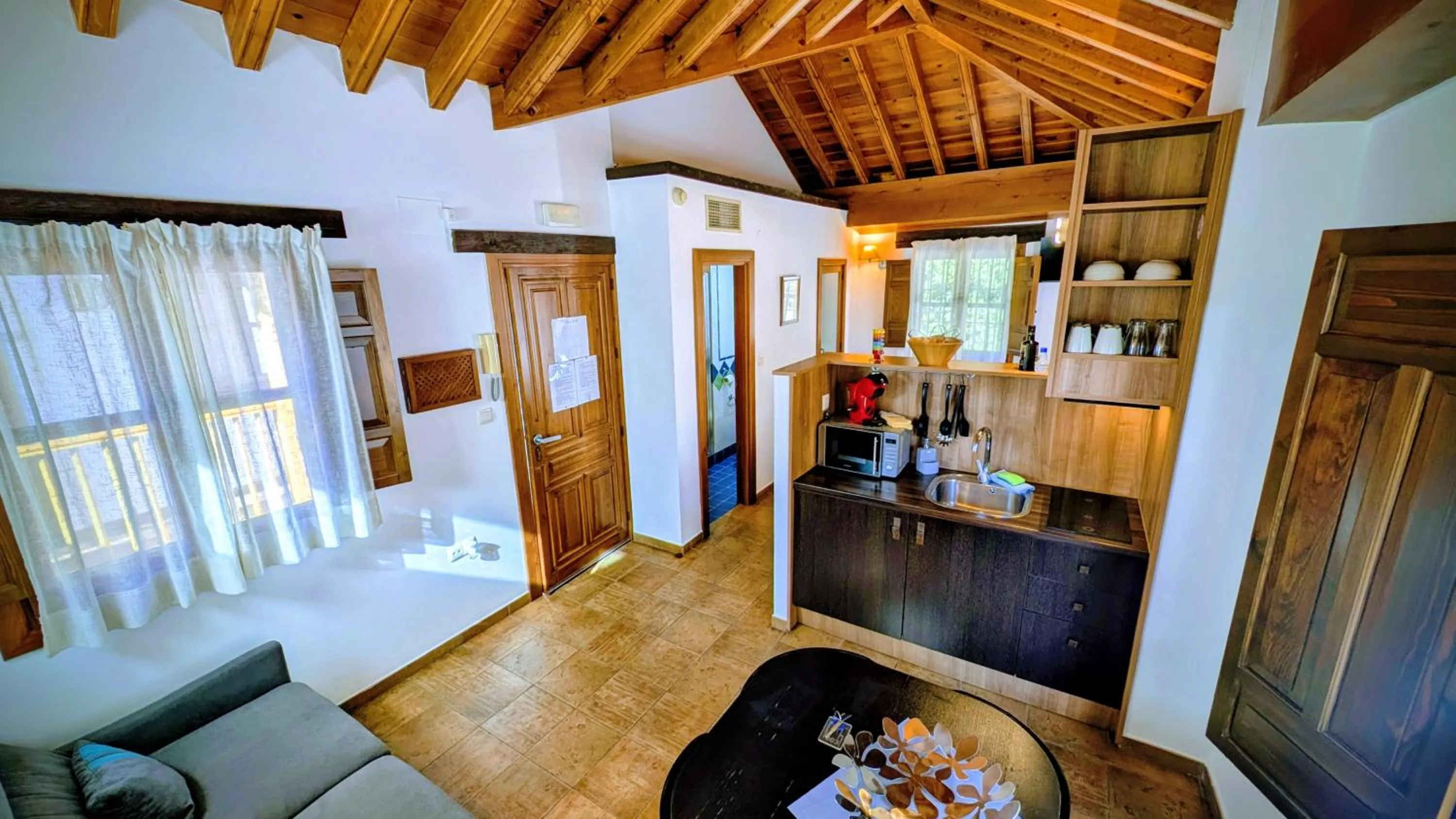 Kitchen or kitchenette in Apartamentos Alhambra