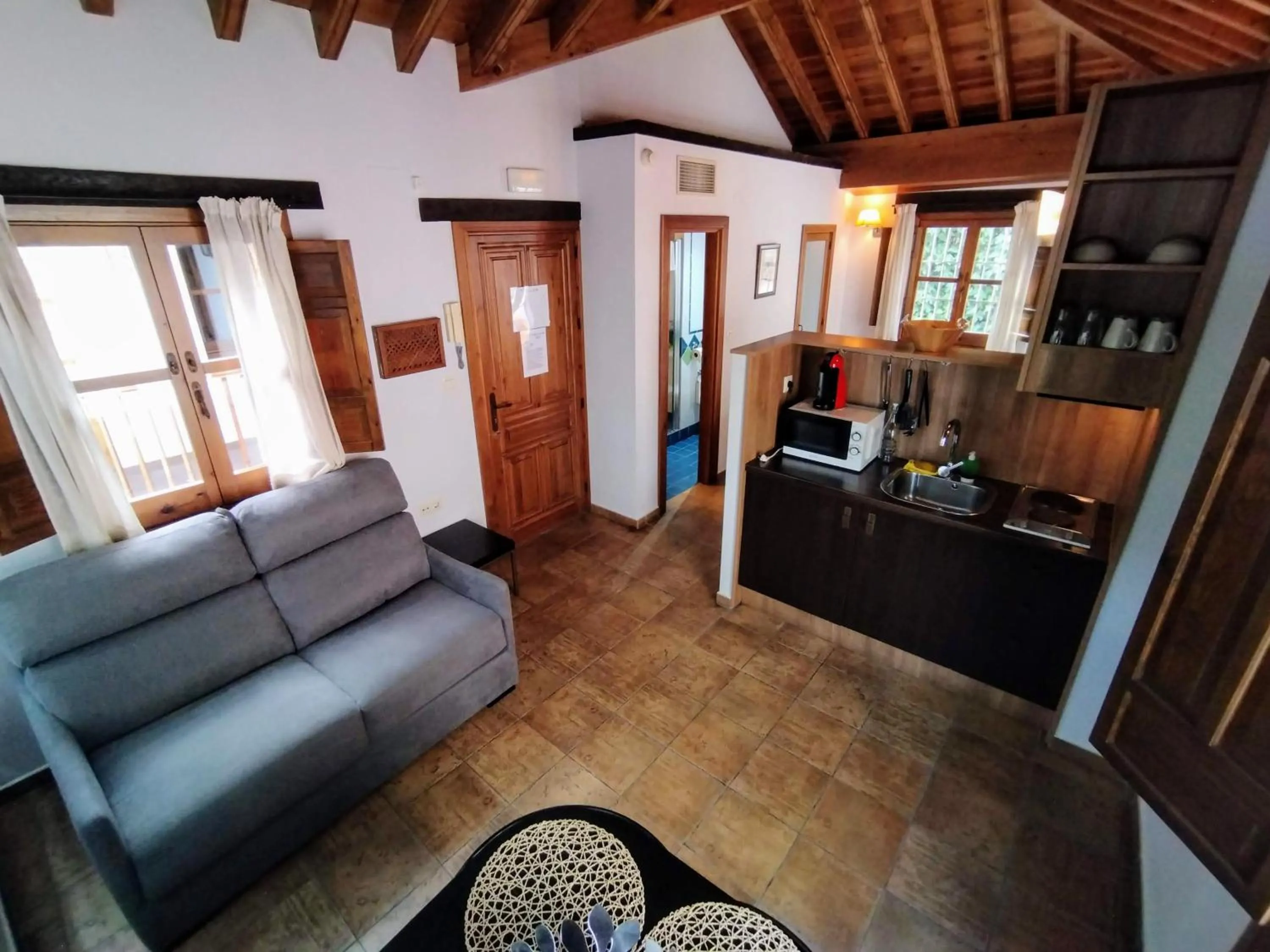 Kitchen or kitchenette in Apartamentos Alhambra