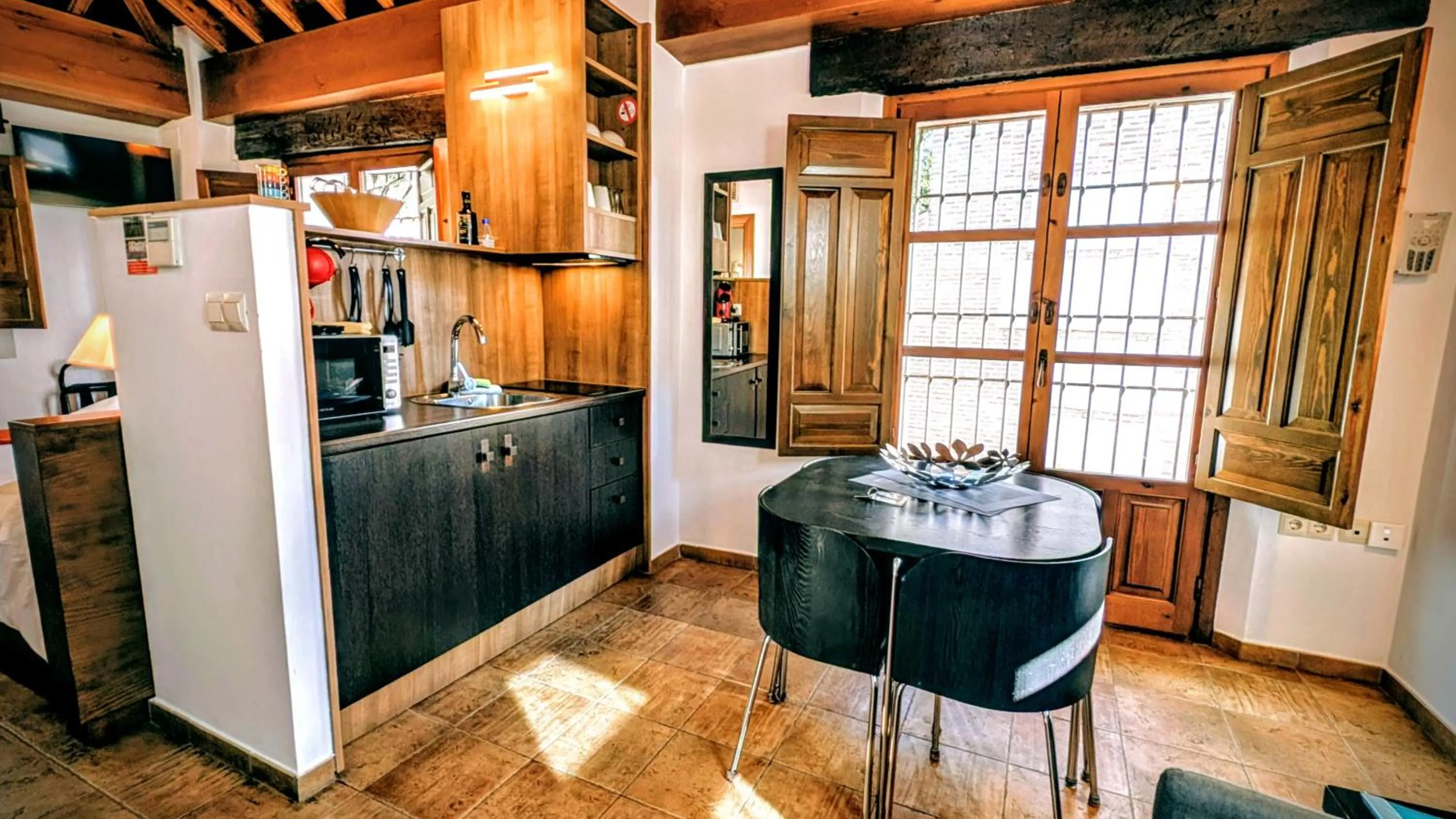 Kitchen or kitchenette in Apartamentos Alhambra