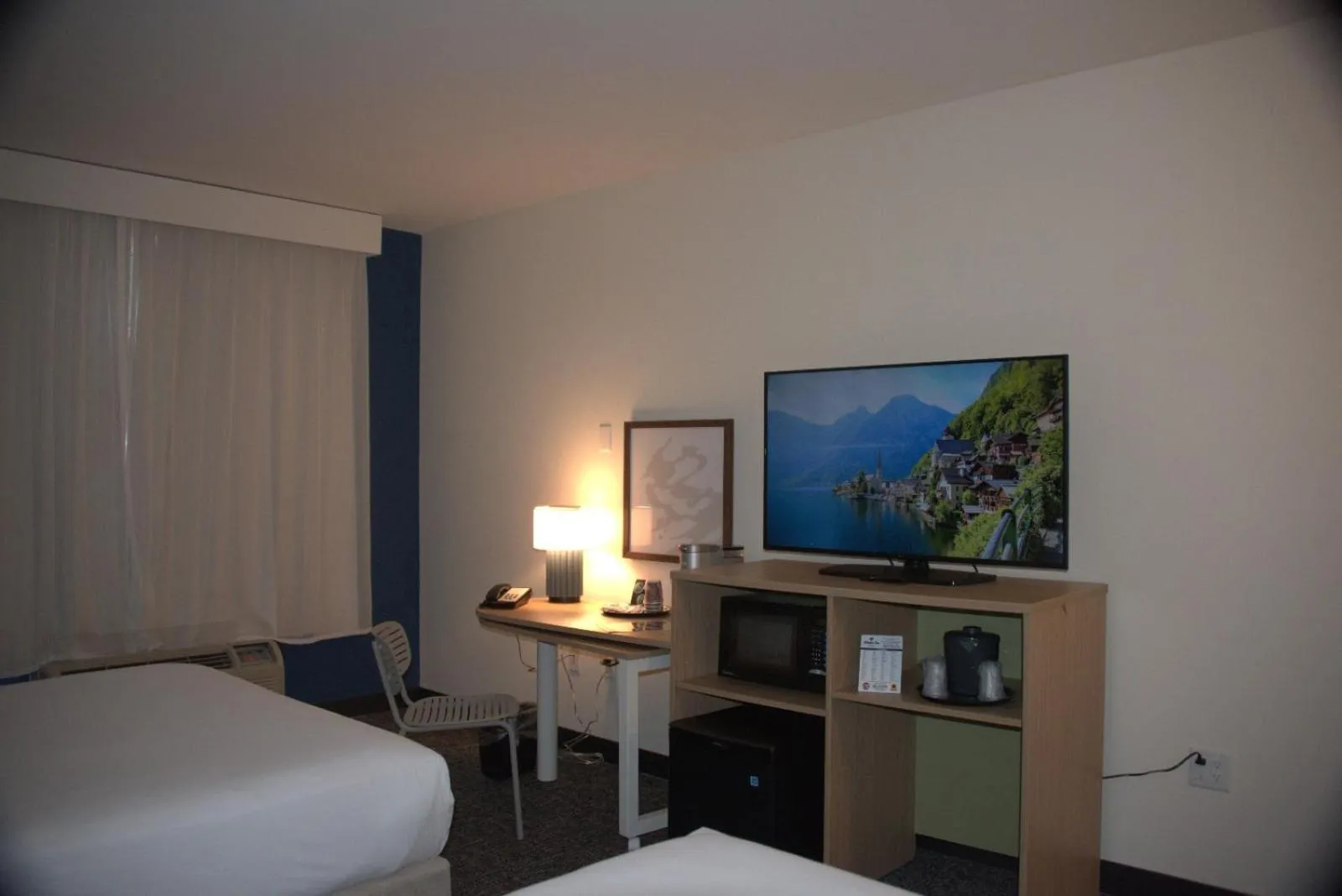 Bed in Ashmore Inn and Suites Amarillo