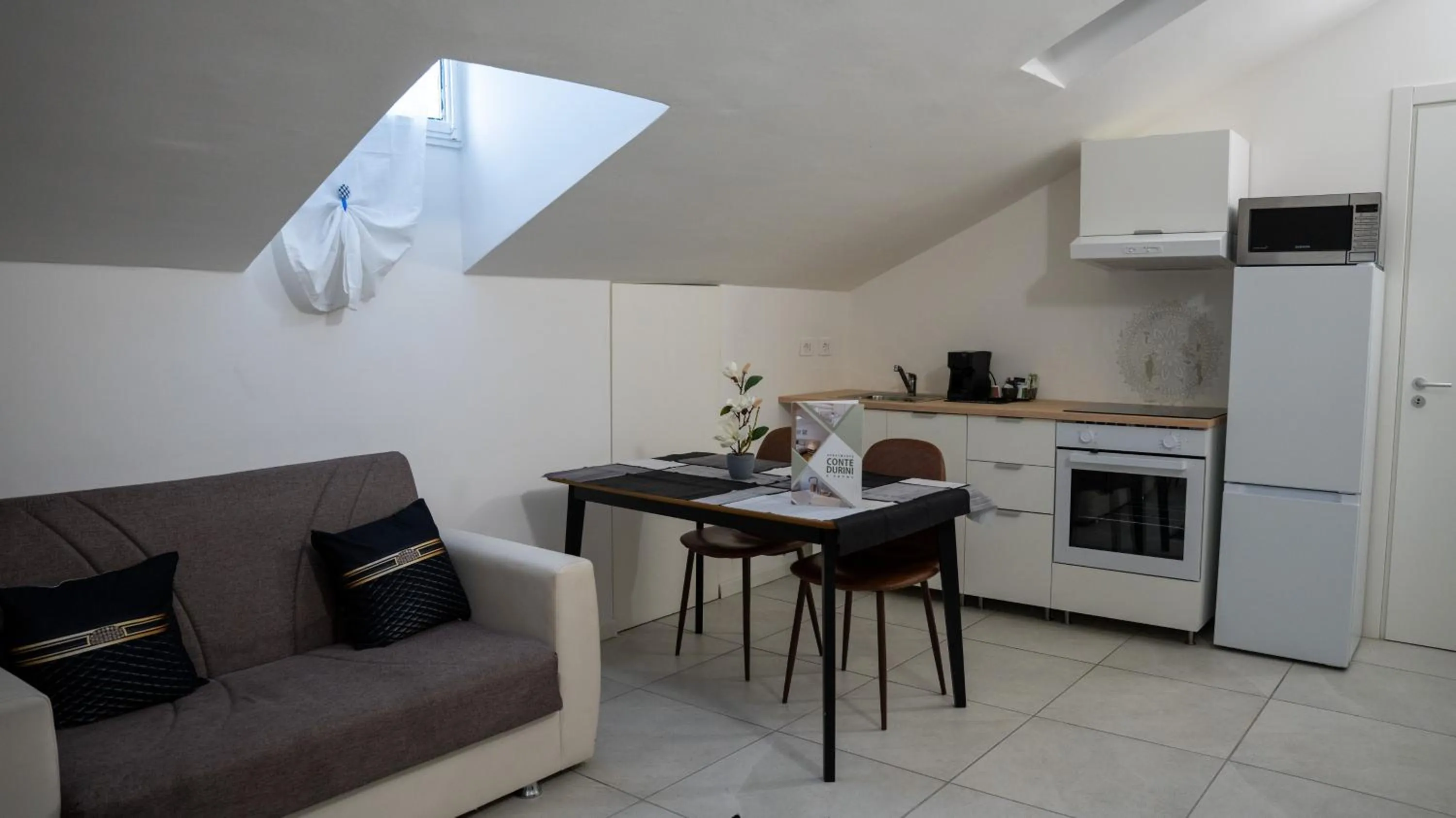 Kitchen or kitchenette in Conte Durini Apartments & Rooms